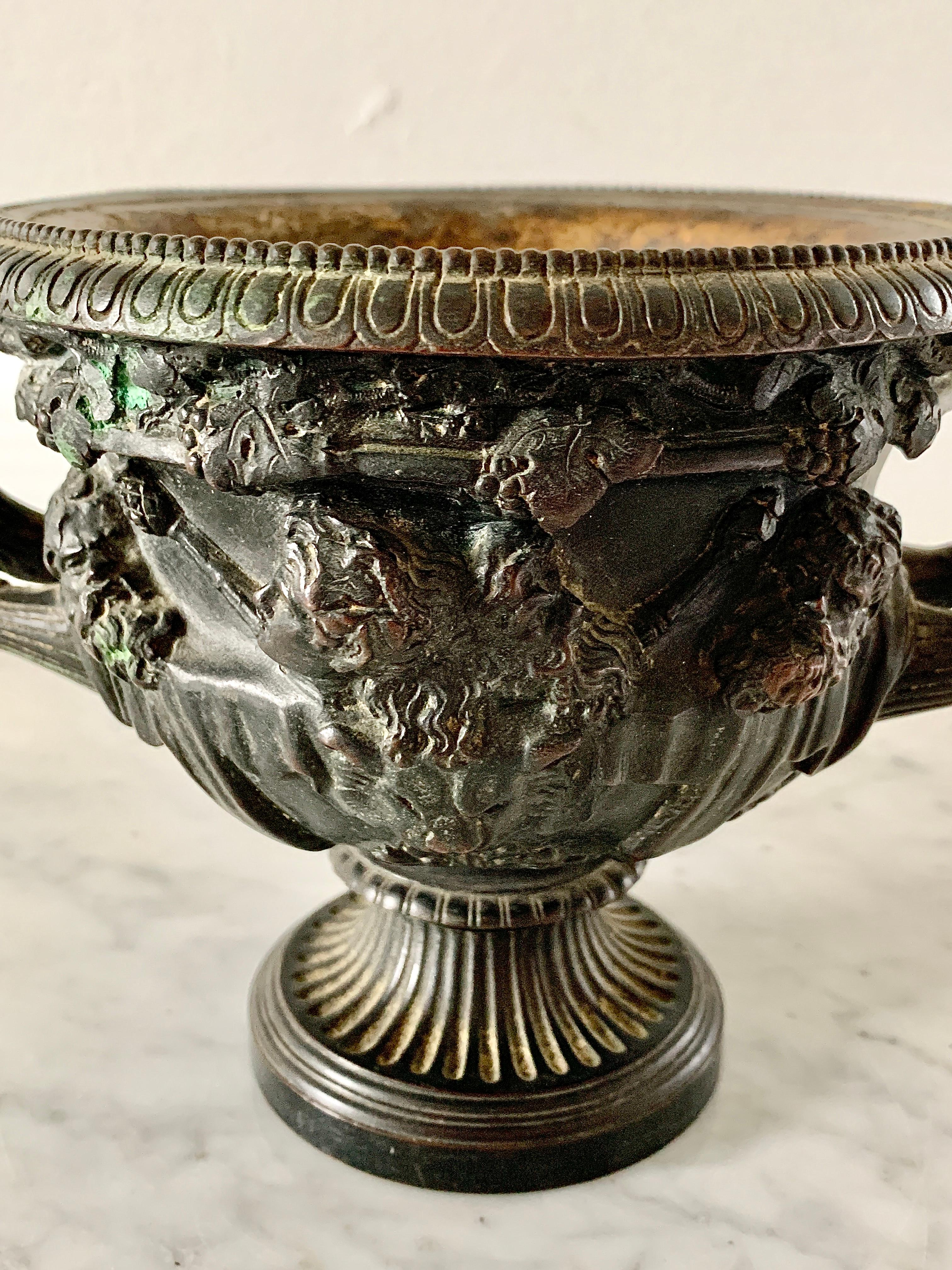A stunning Grand Tour Neoclassical bronze Warwick vase, urn, or cachepot. This is modeled after an original Roman marble vase, which was discovered in Hadrian's Villa, Tivoli by Gavin Hamilton, in 1771. The beauty of this vase became a symbol of