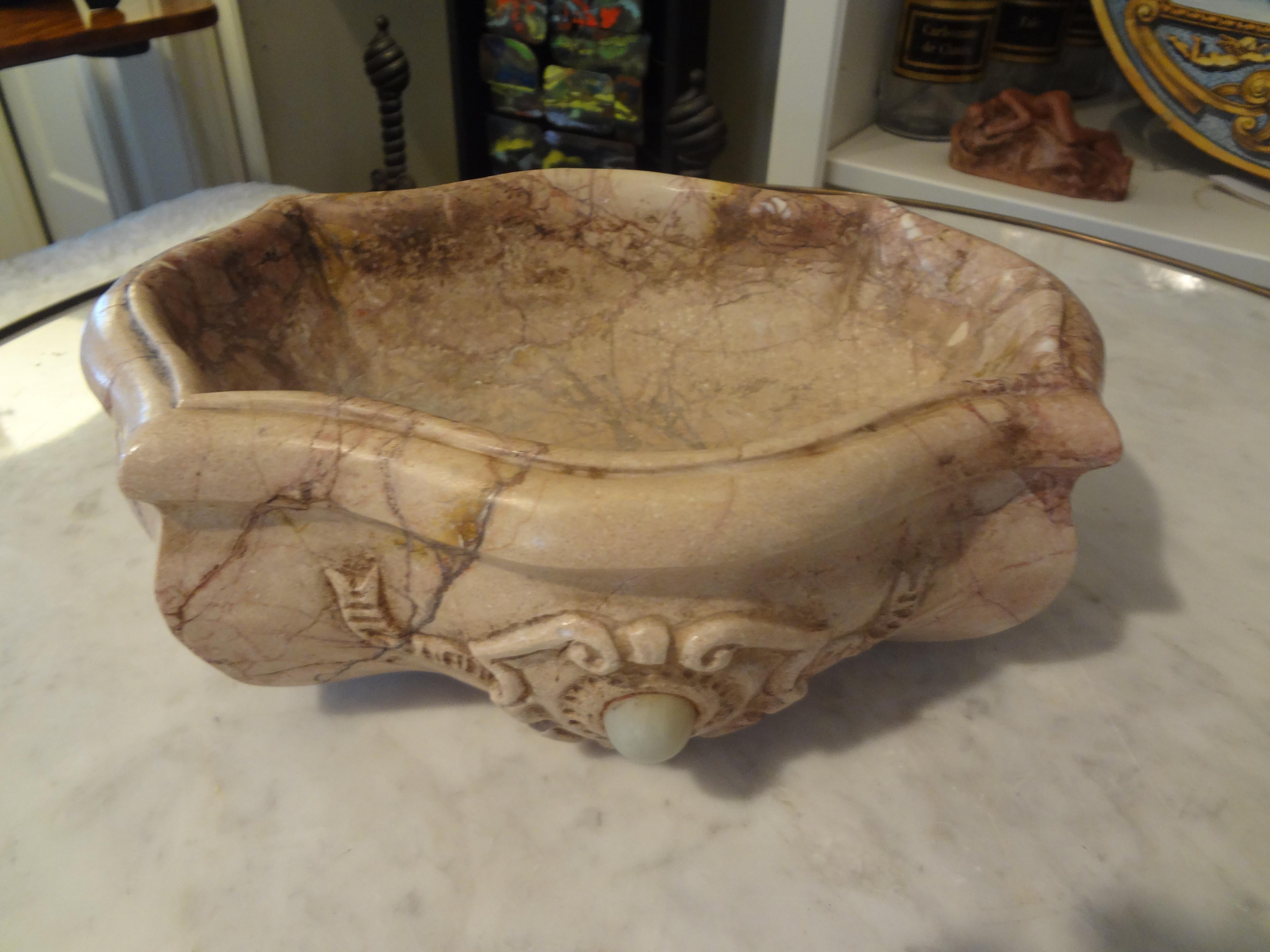 Stunning late 18th-early 19th century marble bowl with carved shield on the front. This bowl of unusual shape makes a great jardinière or decorative table accessory.