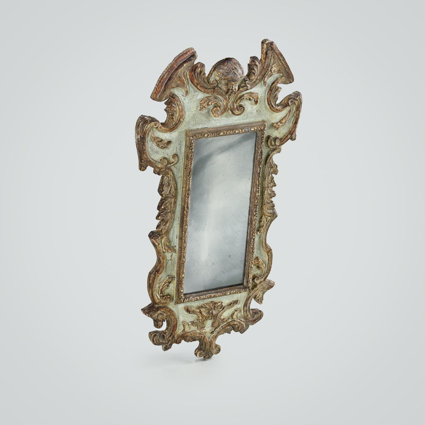 Small 19th Century Italian Mirror. Smokey and sparkly Mercury plate. Circa 1850