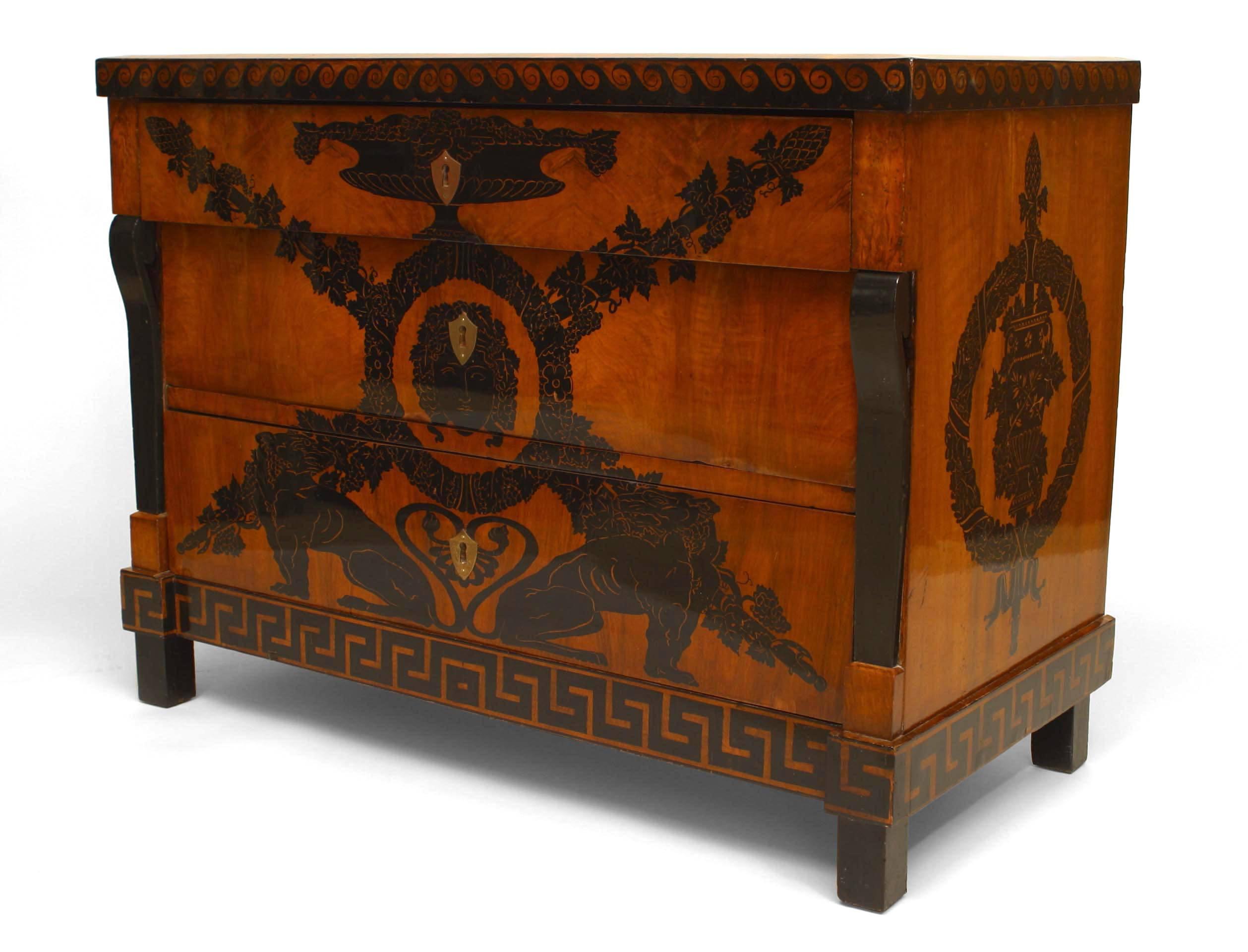 Italian Neo-classic (Early 19th Century) walnut chest with 3 drawers and decorated with ebonized penwork of wreaths, heads and other various motifs.
