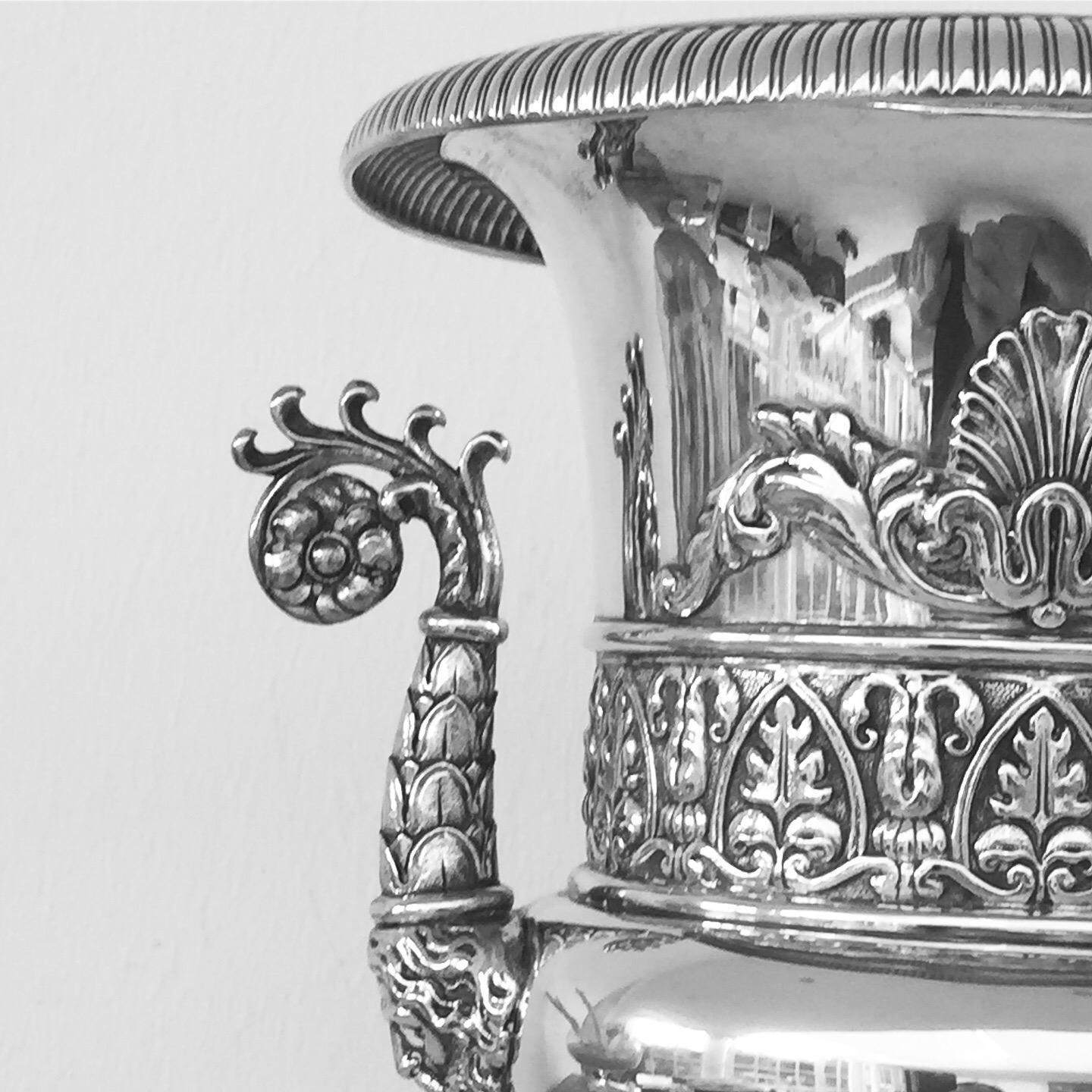 A very decorative neoclassical silver urn stamped by the Italian silversmith Emanuele Caber, dating from around 1825. It has the Milan warranty stamp, and stamp of the silver fineness. A beautiful work inspired by the antique with anthemions and