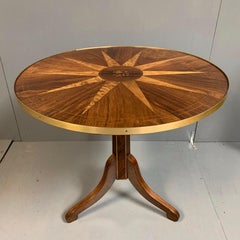 Early 19th century Italian rosewood and birdseye maple tilt top table