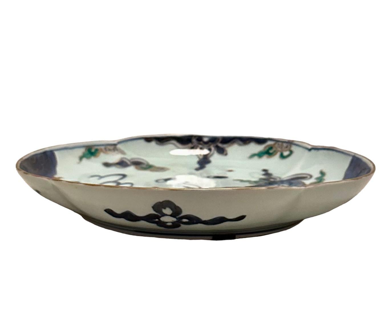 An early 19th century Japanese Imari depicting a dragon in excellent condition for its age and beautiful quality. Has an amazing mark on the back.