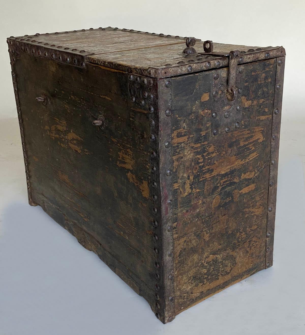 A 19th century box commonly used for storage in shops around Japan. The Edo period box features a partial lift top that gives access to interior of box. Intricate little star designed studs in corners and all original hardware. Beautiful old worn