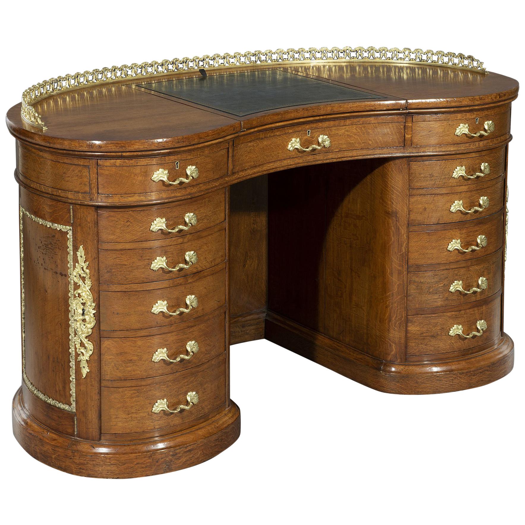 Early  19th Century Kidney-Shaped Ormolu Mounted Brown Oak Desk  For Sale