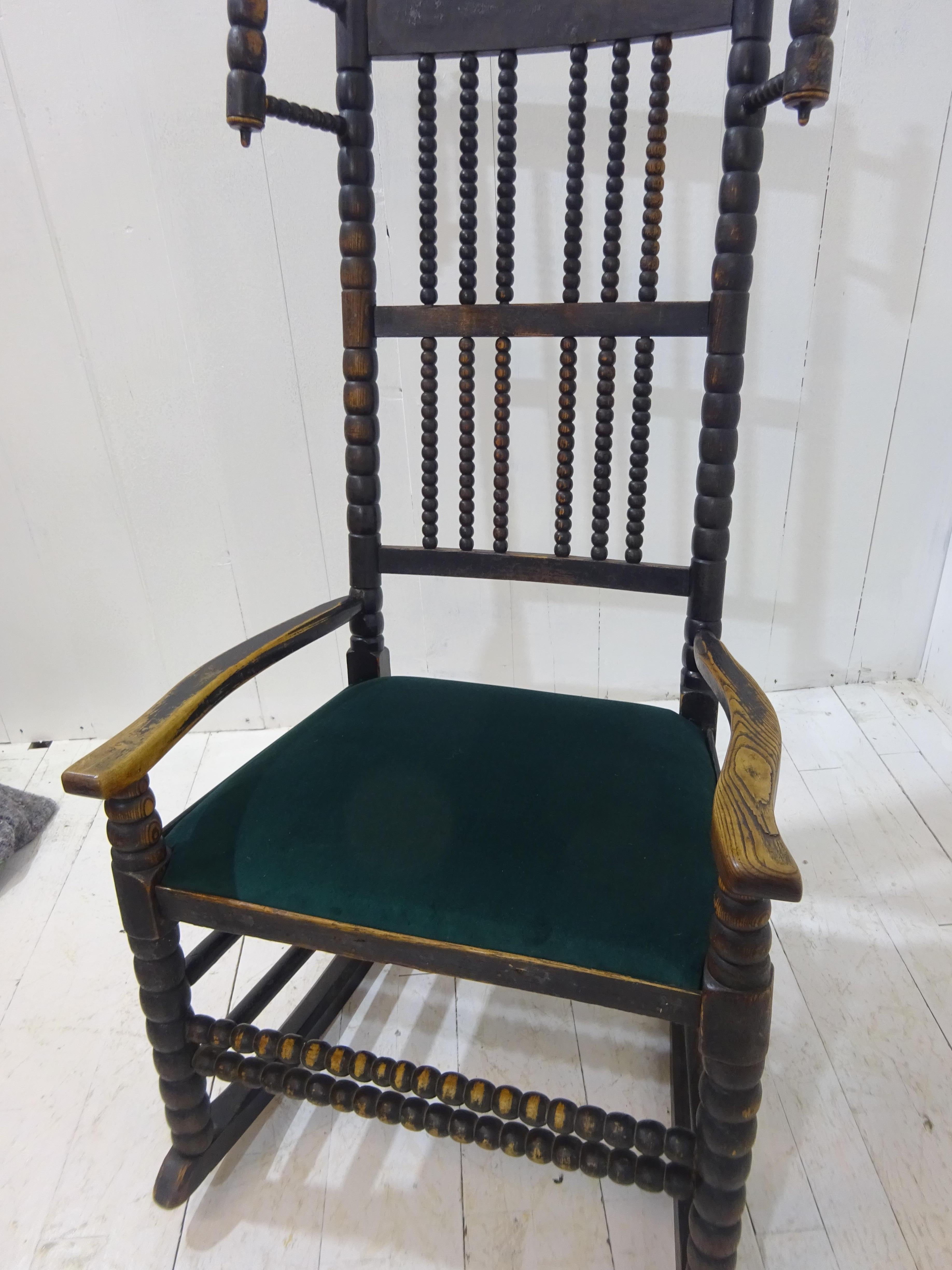 Lancashire Bobbin rocking chair 

An original Lancashire bobbin rocking chair. 

A bobbin rocking chair with wool winders, early 19th century.  These were country chairs found in the English areas of Lancashire and Cheshire. Wool winders would