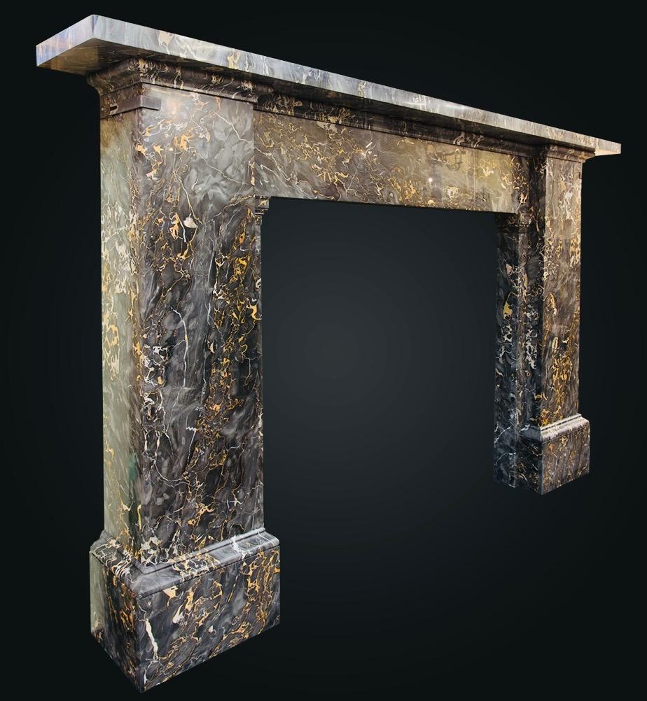 A prodigious and very grand early Georgian 19th century Scottish Edinburgh New Town (Rutland Square) 1830 Portoro Marble fireplace Surround in the Egyptian revival manner. A large and generous width shelf sits above an unadorned frieze, directly