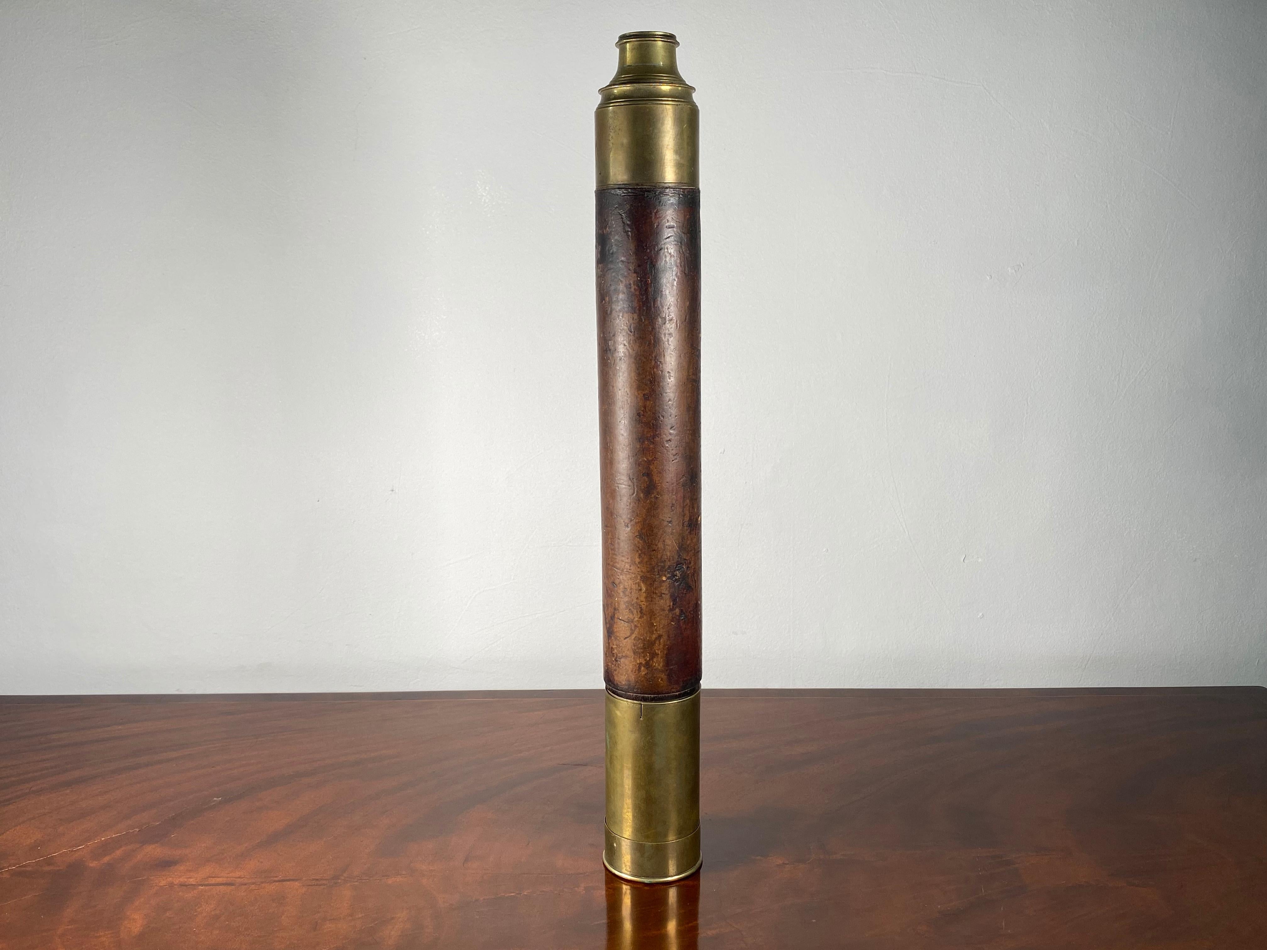 A beautiful leather-bound brass telescope dating from the early 19th century, although the large lens as a chip to the edge of the lens this does not seem to affect it functioning very well as a telescope.