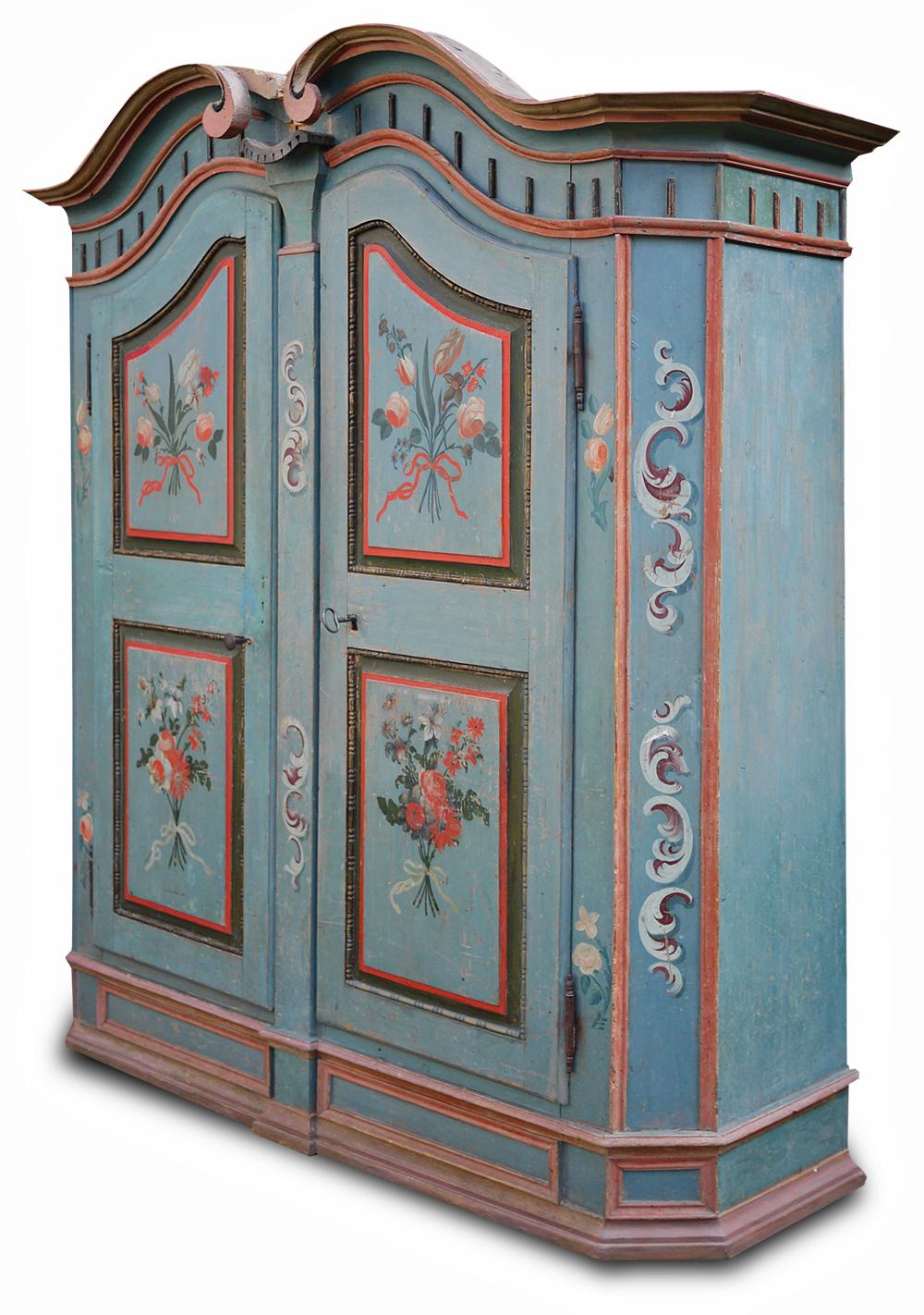 Tyrolean (Northern Italy) blue painted wardrobe

Measures: H 187 cm, L 170 cm, P 54 cm

Tyrolean painted wardrobe with two doors, entirely painted in light blue. Floral and Baroque motifs are distributed over the entire surface, especially on the