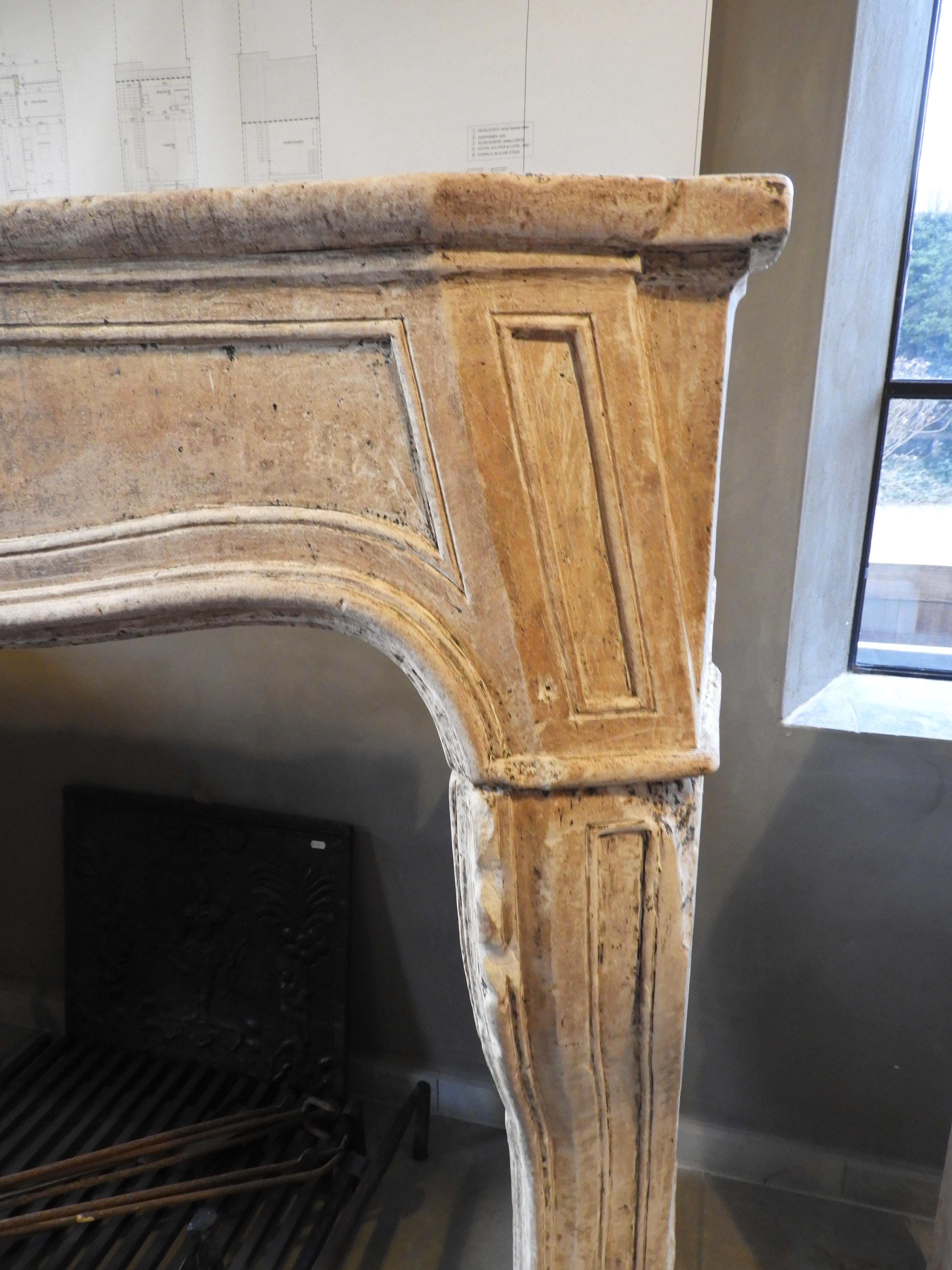 French Early 19th Century Louis XV Fireplace in White Beige Stone with Original Patina For Sale