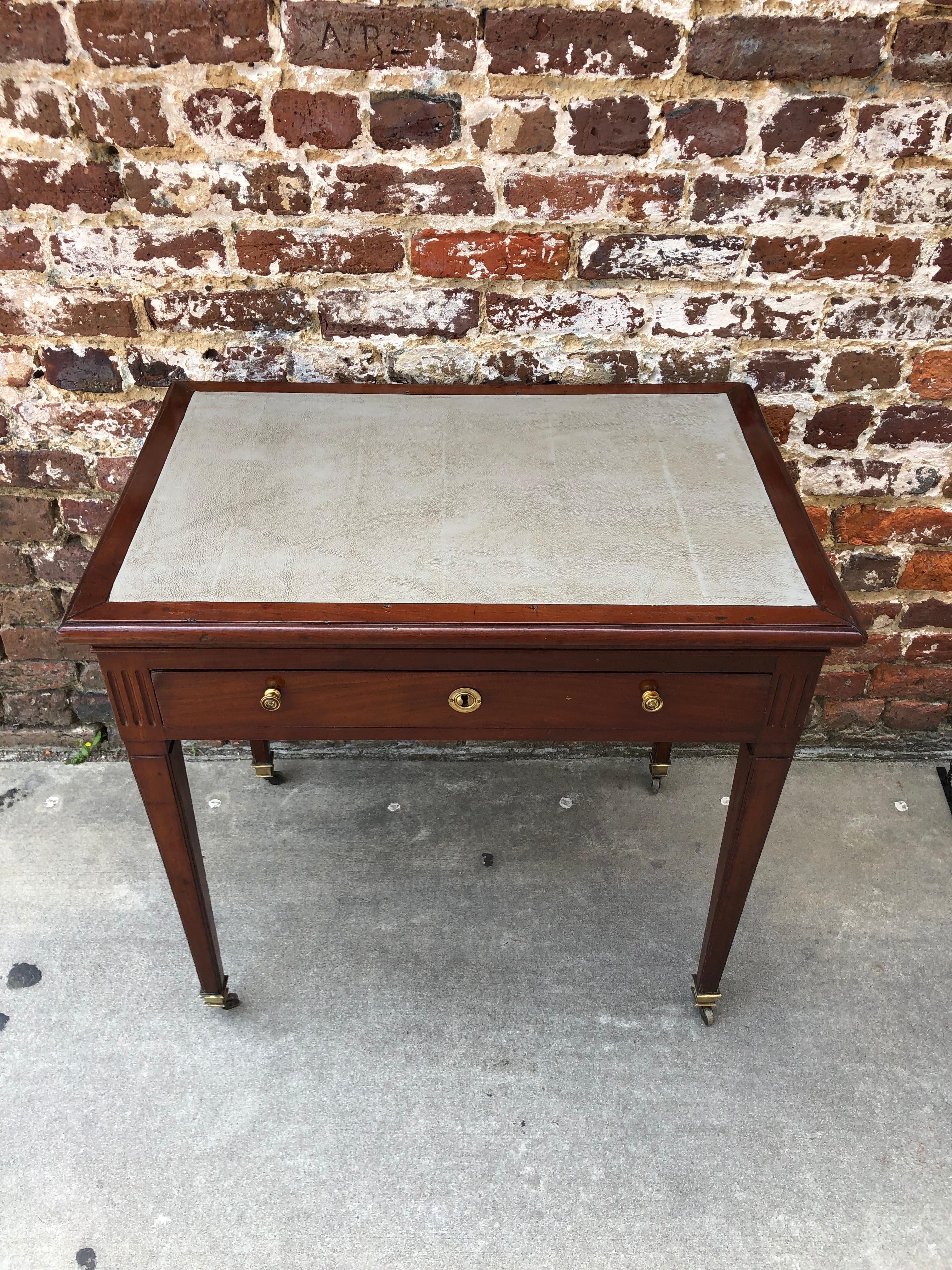 Early 19th century mahogany architects desk or drafting table. The top can be adjusted to multiple working heights.