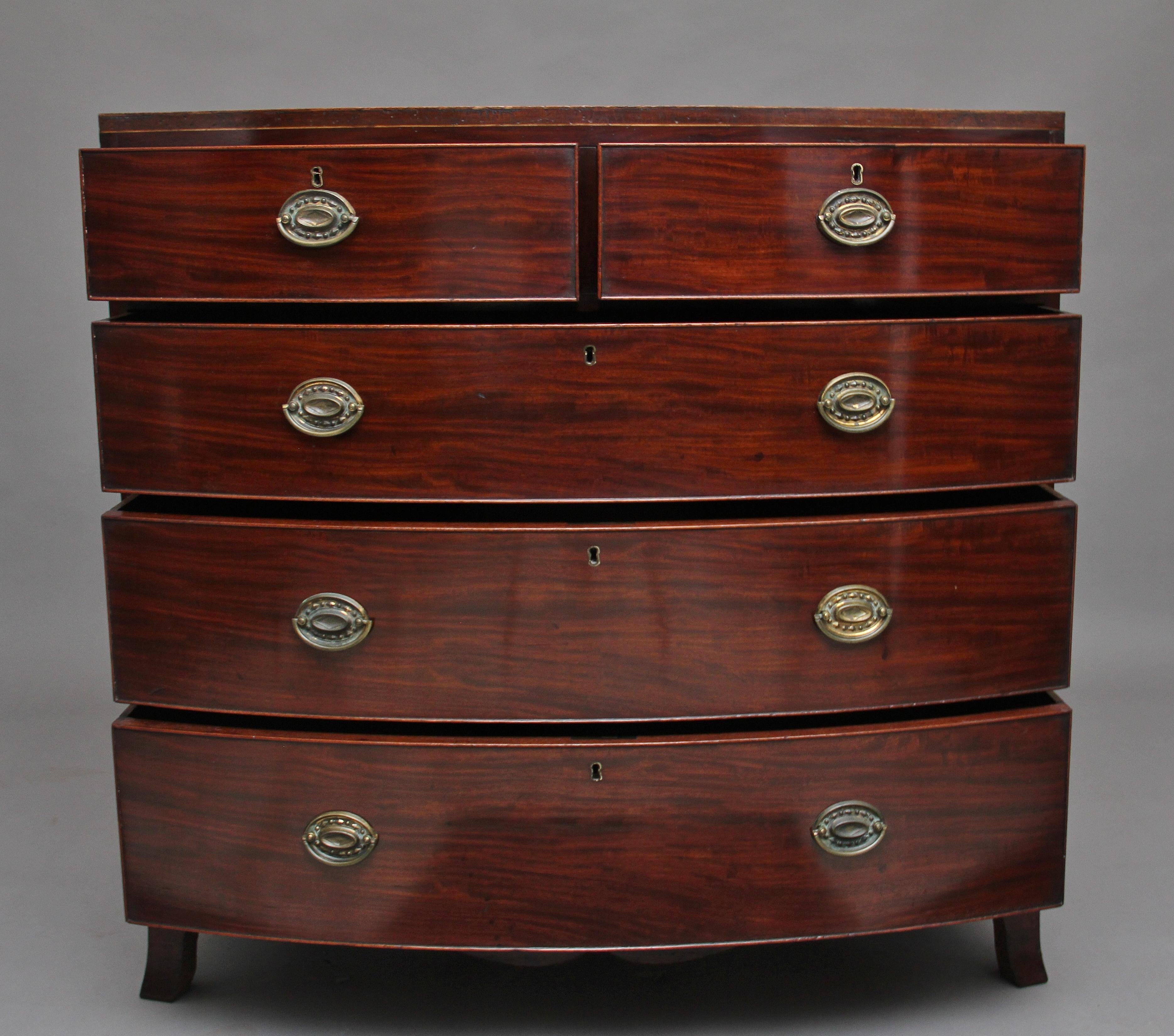 Early 19th century mahogany bowfront chest of drawers, having two short over three long graduated drawers with brass oval plate handles, having a nice shaped apron supported on splay feet, circa 1810.