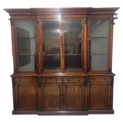 Early 19th Century mahogany break front bookcase Early 19th Century mahogany break front bookcase