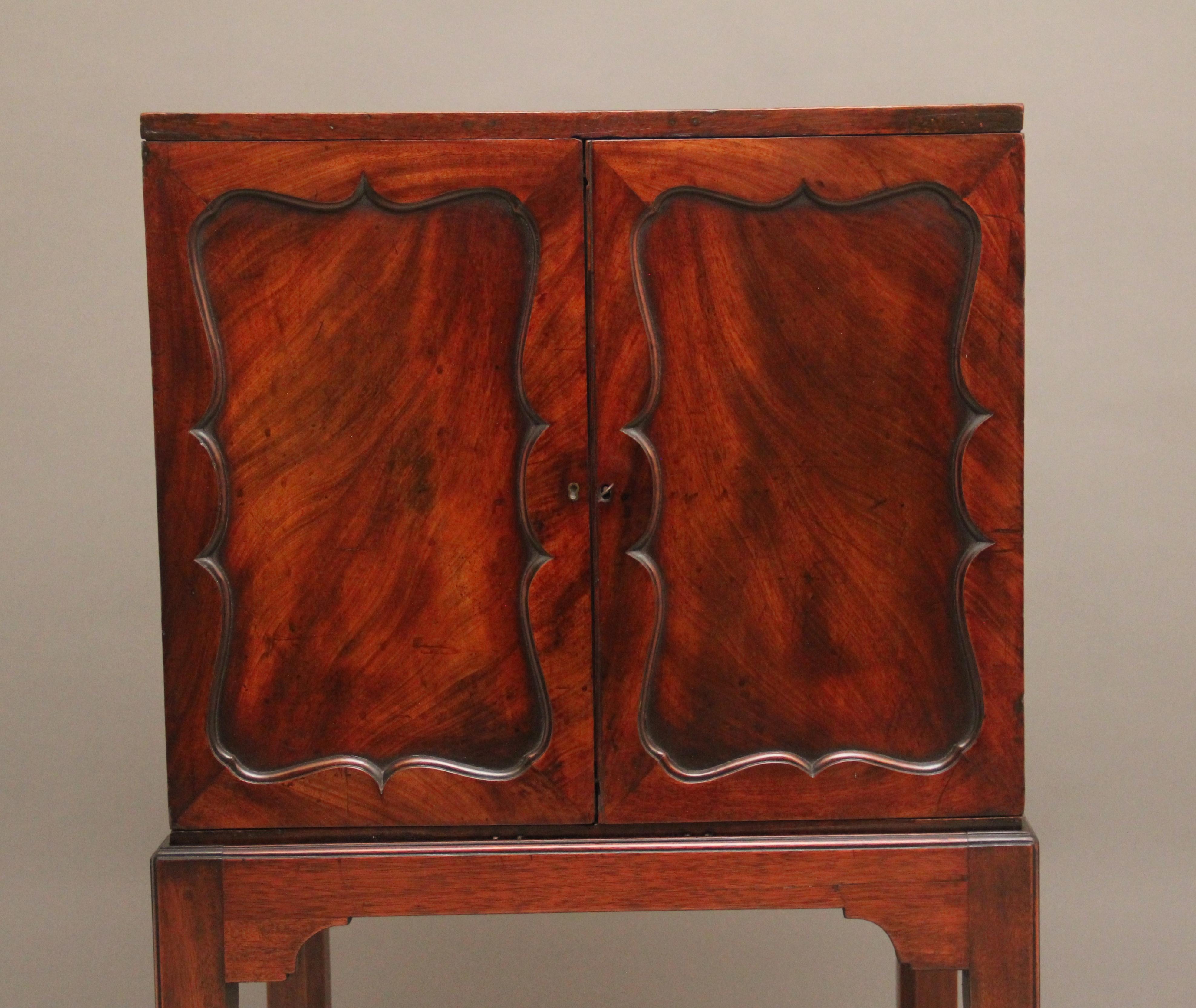 Early 19th Century mahogany cabinet on stand In Good Condition For Sale In Martlesham, GB