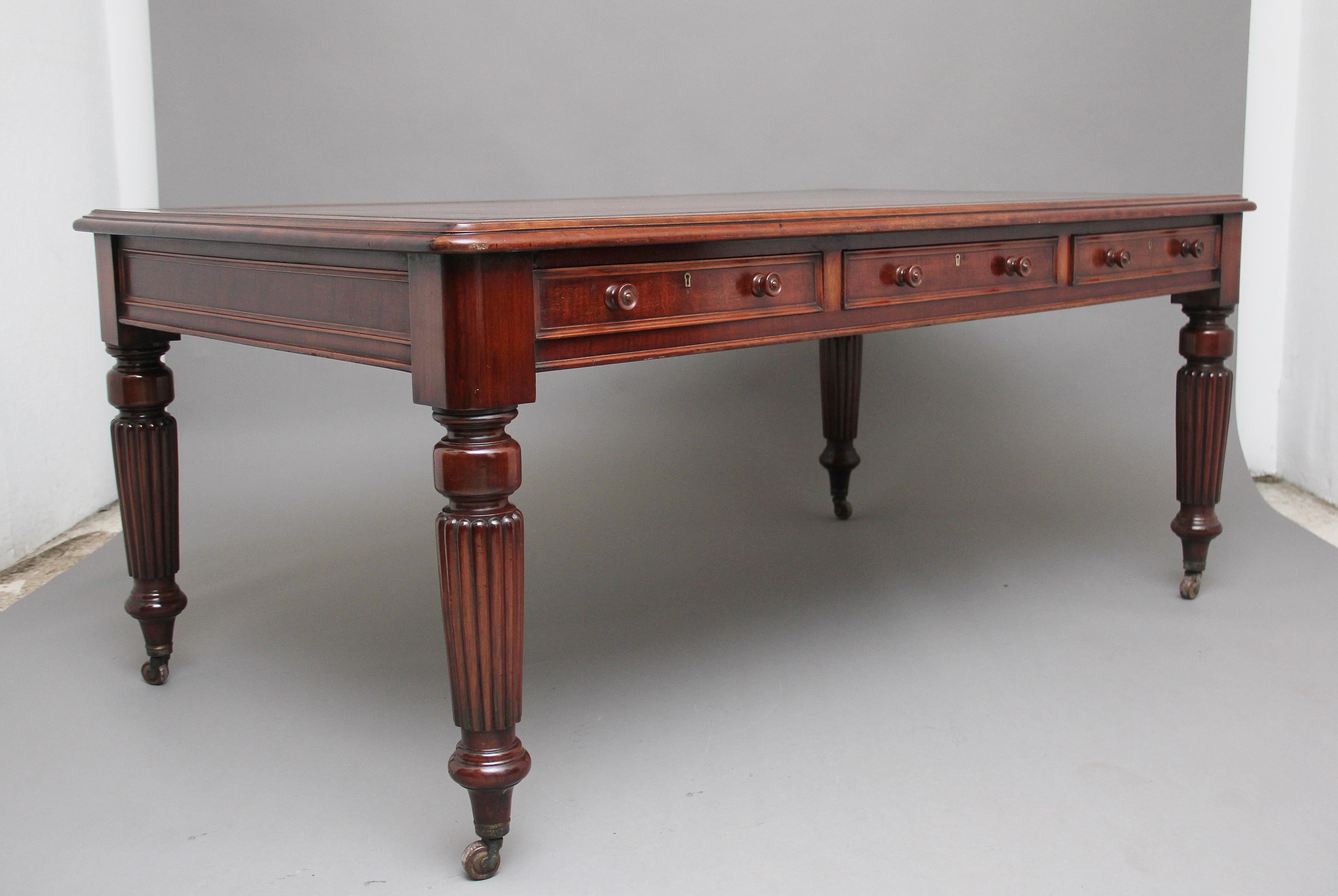 A lovely quality early 19th century mahogany partners writing desk stamped 