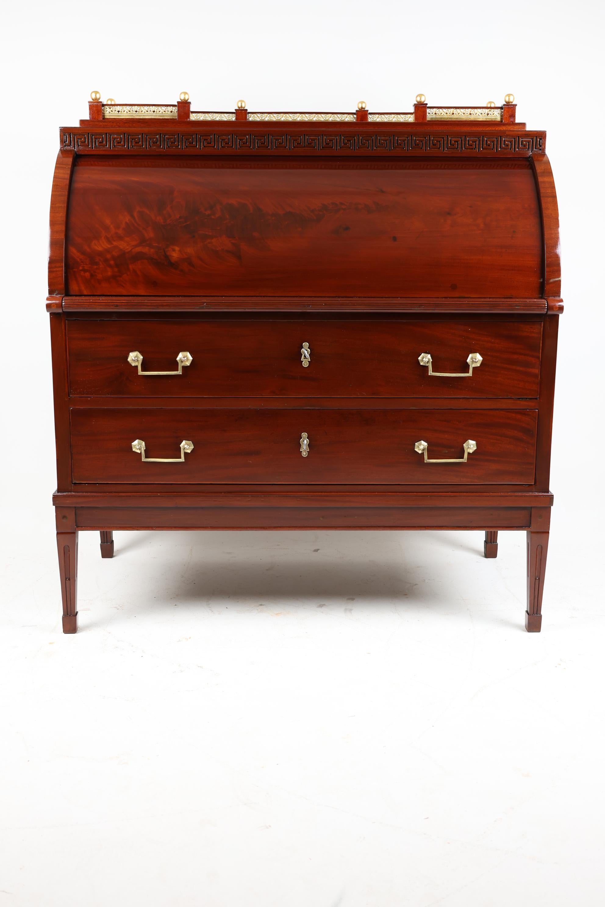Early XIX Century Mahogany Secretary
Germany, 1800
Mahogany

This classicist cylinder bureau made of mahogany dates from 1810 and is an original from the Empire & Biedermeier era. The secretary is 109 cm wide, 60 cm long and 120 cm high. The color