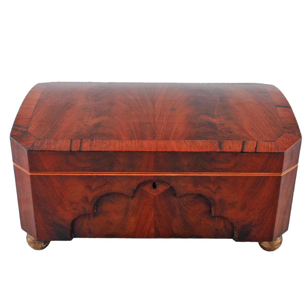 Early 19th century mahogany sewing box

An early 19th century continental mahogany sewing or needlework box.

The box has a domed lid that has flamed mahogany and rosewood cross banding, while the interior has a lift out fitted tray to hold