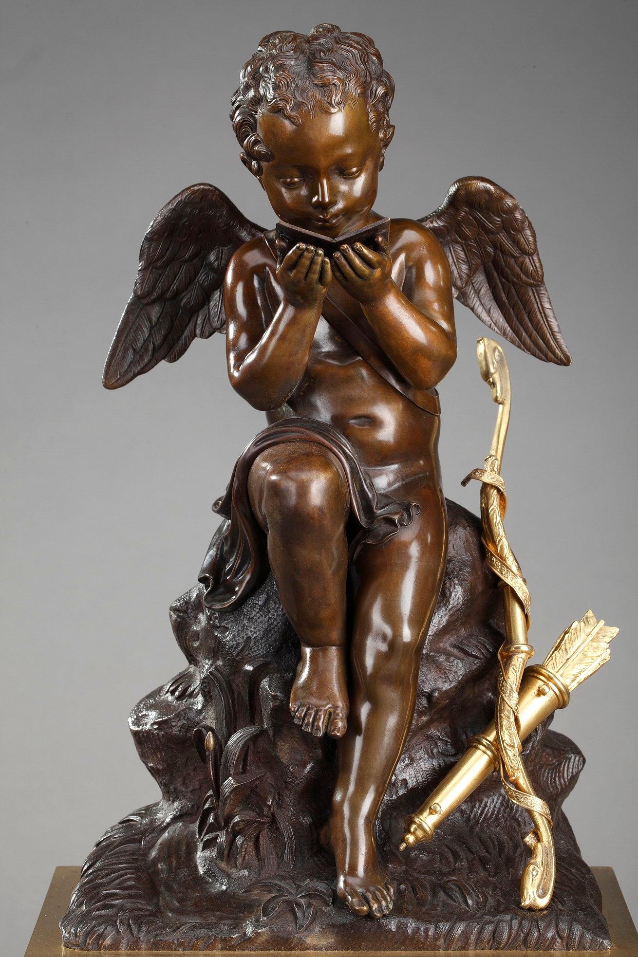 Français Horloge en marbre du début du 19e siècle, lecture de Cupidon par Ledure et Hémon en vente