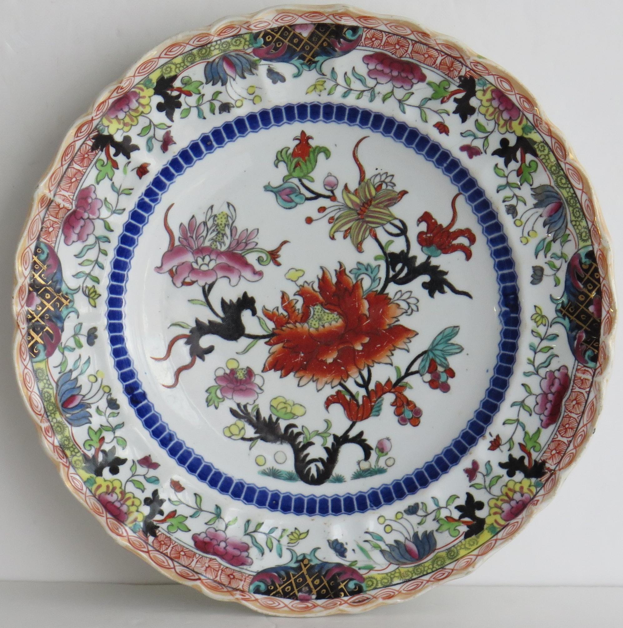 This Ironstone pottery desert plate was made by the Mason's factory at Lane Delph, Staffordshire, England and is decorated in the ragged rose pattern, dating to the 19th century, Circa 1825.

This is a rare pattern.

The design is one of Mason's