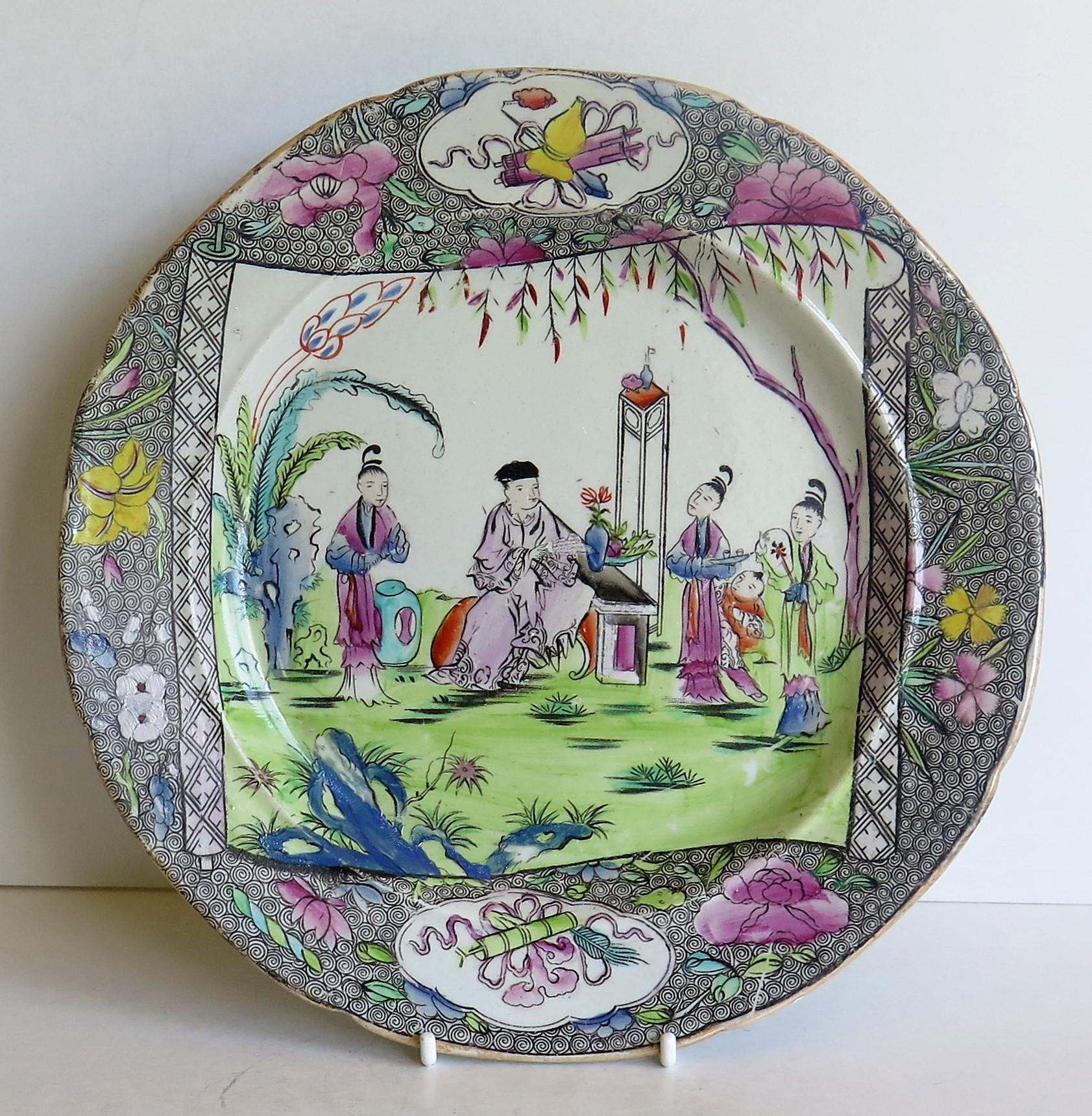This Ironstone pottery dinner plate was made by the Mason's factory at Lane Delph, Staffordshire, England and is decorated in the Chinese Scroll Pattern, fully stamped and dating to the earliest period of Mason's Ironstone production, circa