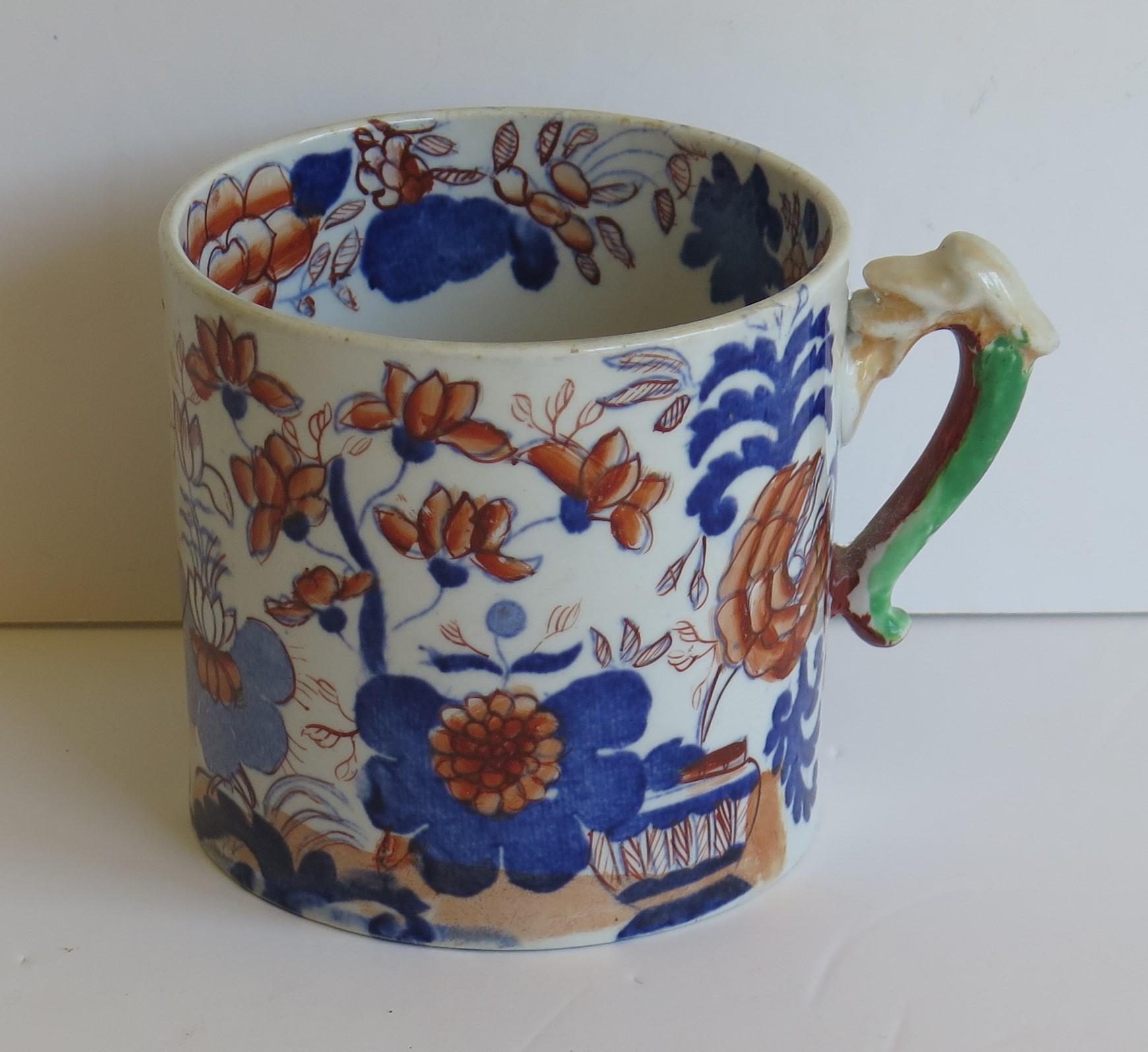 This is a good Ironstone pottery mug made by the English factory of Mason's Ironstone, fully marked and dating to the early 19th century, circa 1825.

Early Mason's mugs tend to be fairly rare and hard to find.

The mug is cylindrical with