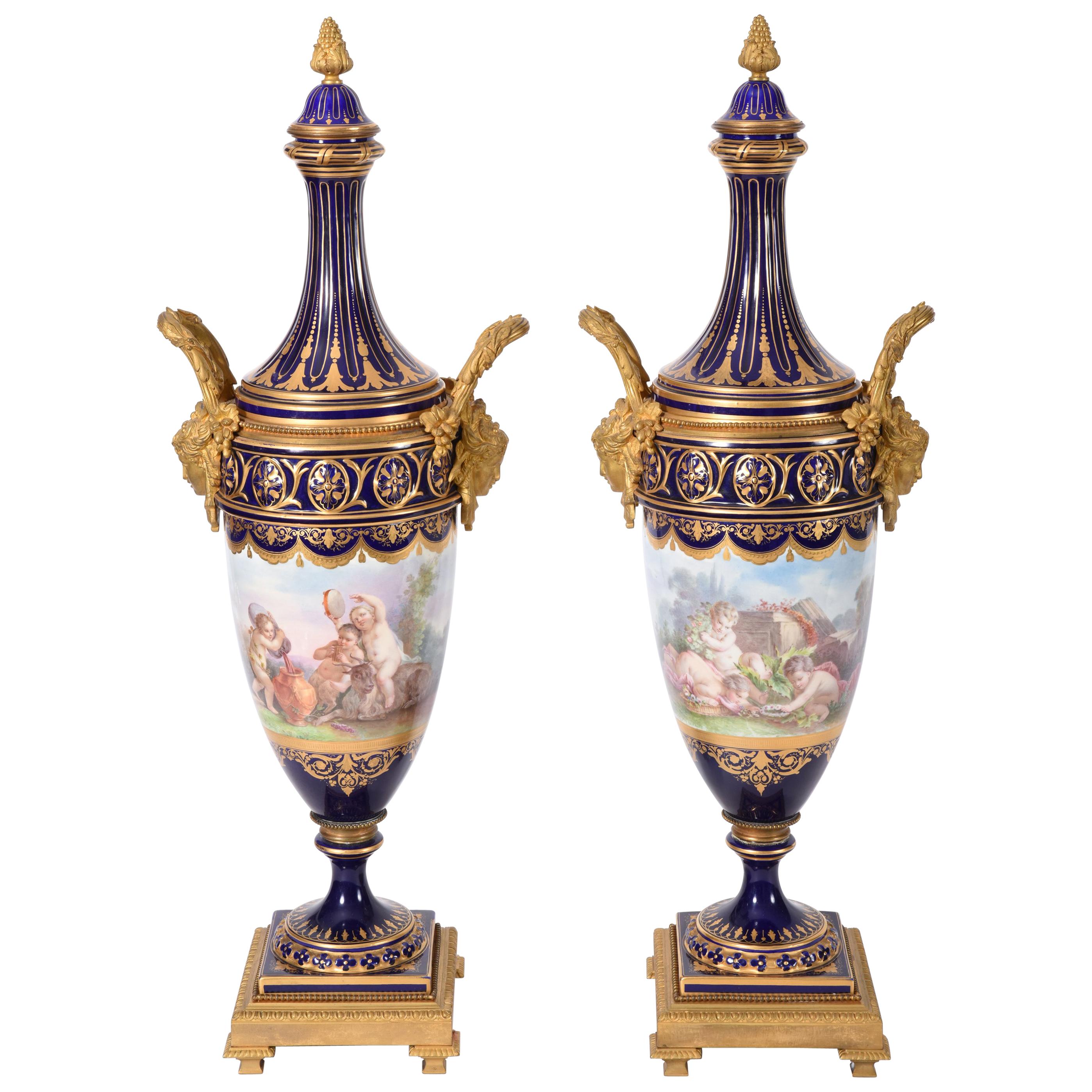 Early 19th Century Matching Pair of Bronze Mounted Porcelain Urns