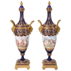 Early 19th Century Matching Pair of Bronze Mounted Porcelain Urns
