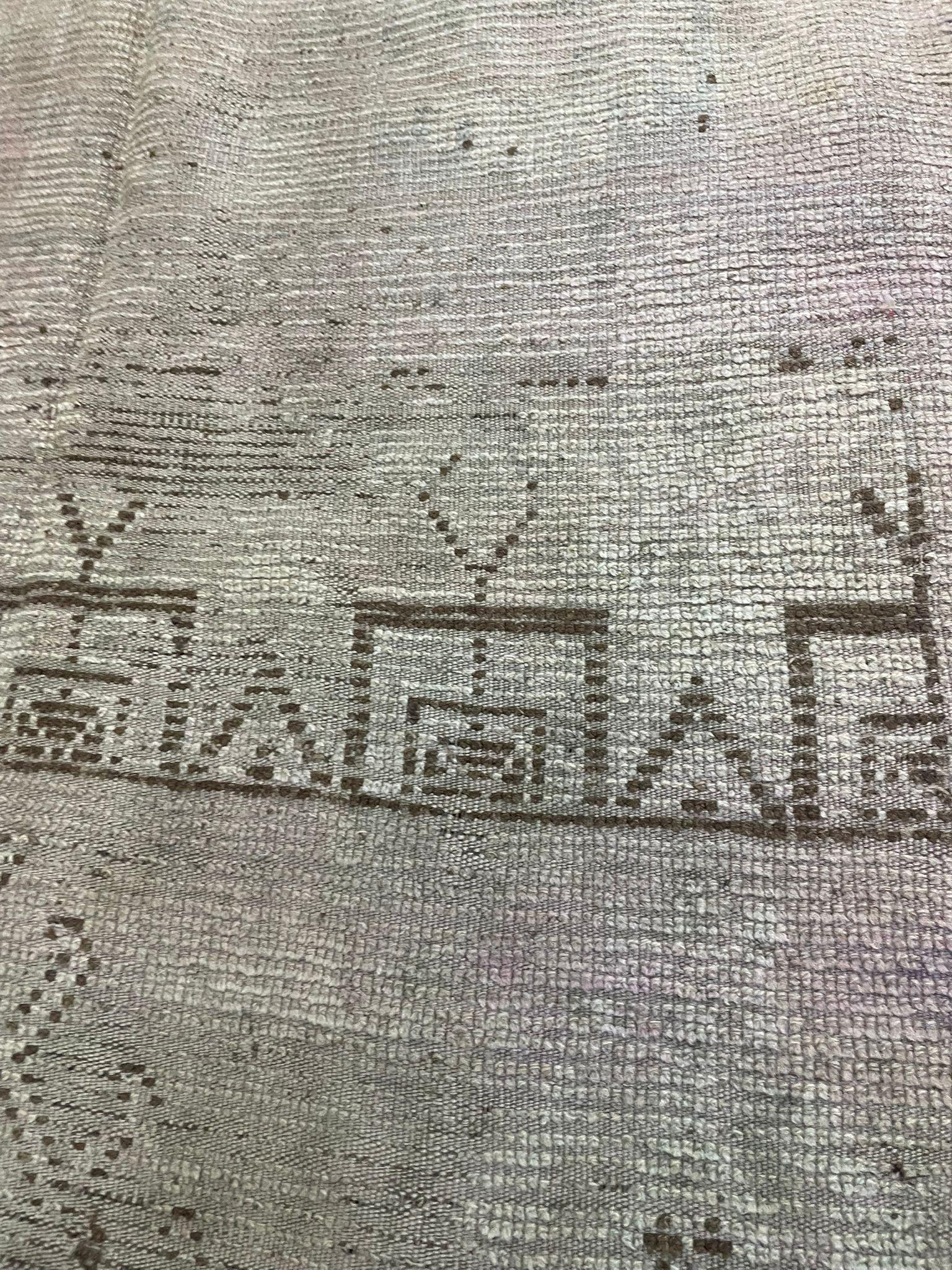 19th Century Early 19th-Century Moroccan Tribal Flatweave Rug with Faded Geometric Medallions For Sale