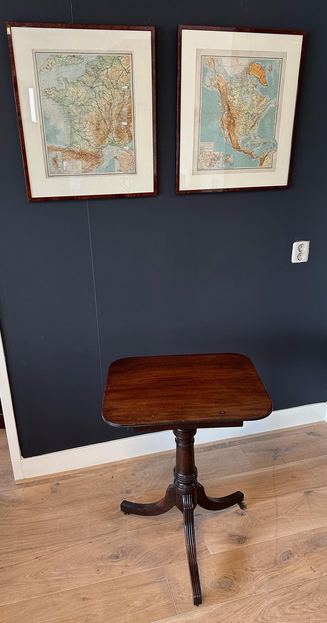Beautiful antique mahogany music stand / book stand in perfect and original condition. Beautiful patina. It can be used as a side table, music stand or as a book stand. Top is adjustable. Adjustable in height. Pull-out leaf for a candlestick. And a