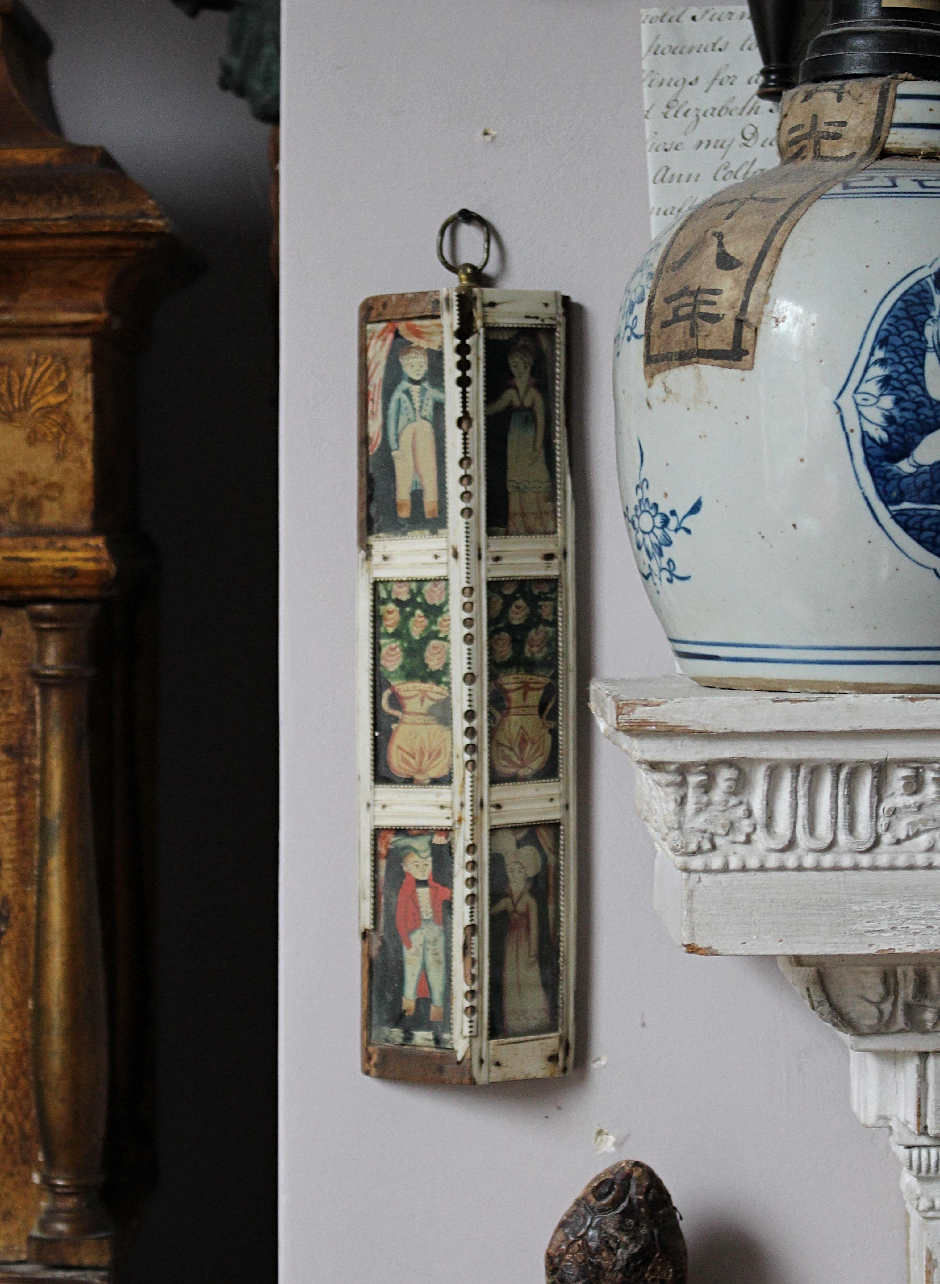 Beautiful and rare early 19th century casket lid from a cribbage or domino box. Fashioned by a prisoner of war in the 1820s. Entirely hand-carved and painted, depicting young women, bouquets of flowers and dandies.  This piece shows a remarkable