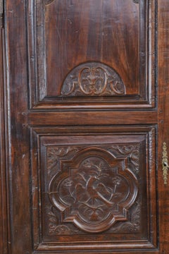 Early 19th Century Narrow French Bonnetiere or Cupboard with Carved Birds