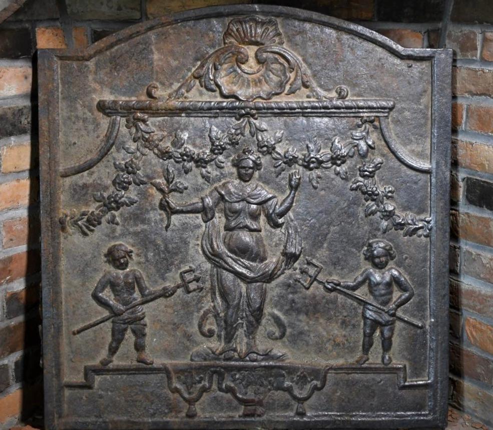 Fine 19th Century Cast Iron Fireback.  Of Panel form with fine detail of Venus being attended by two putti with tridents.  Quite a well executed piece.  Removed from a New Hampshire Federal home.