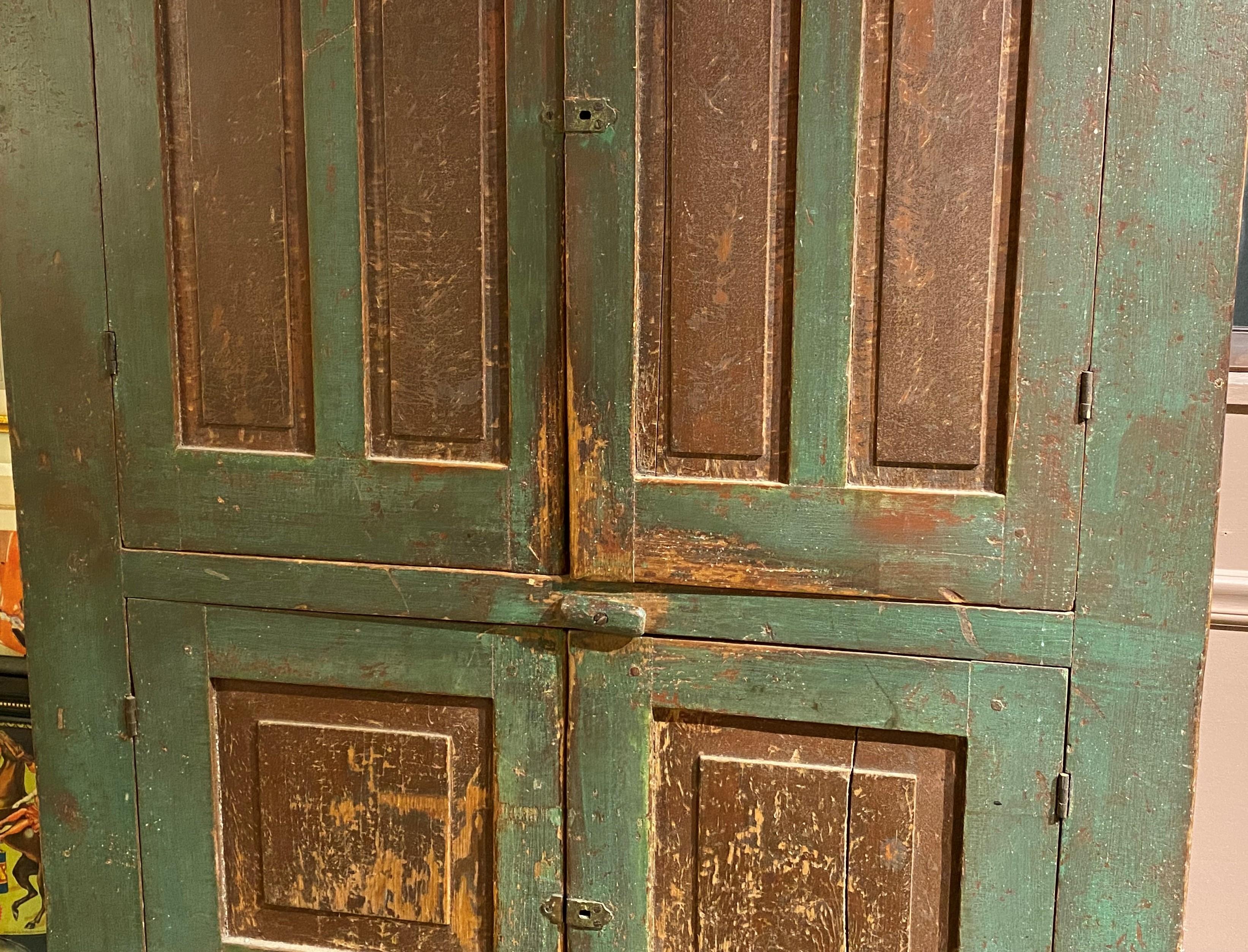 American Early 19th Century New England Paneled Cupboard in Green & Reddish Brown Paint For Sale