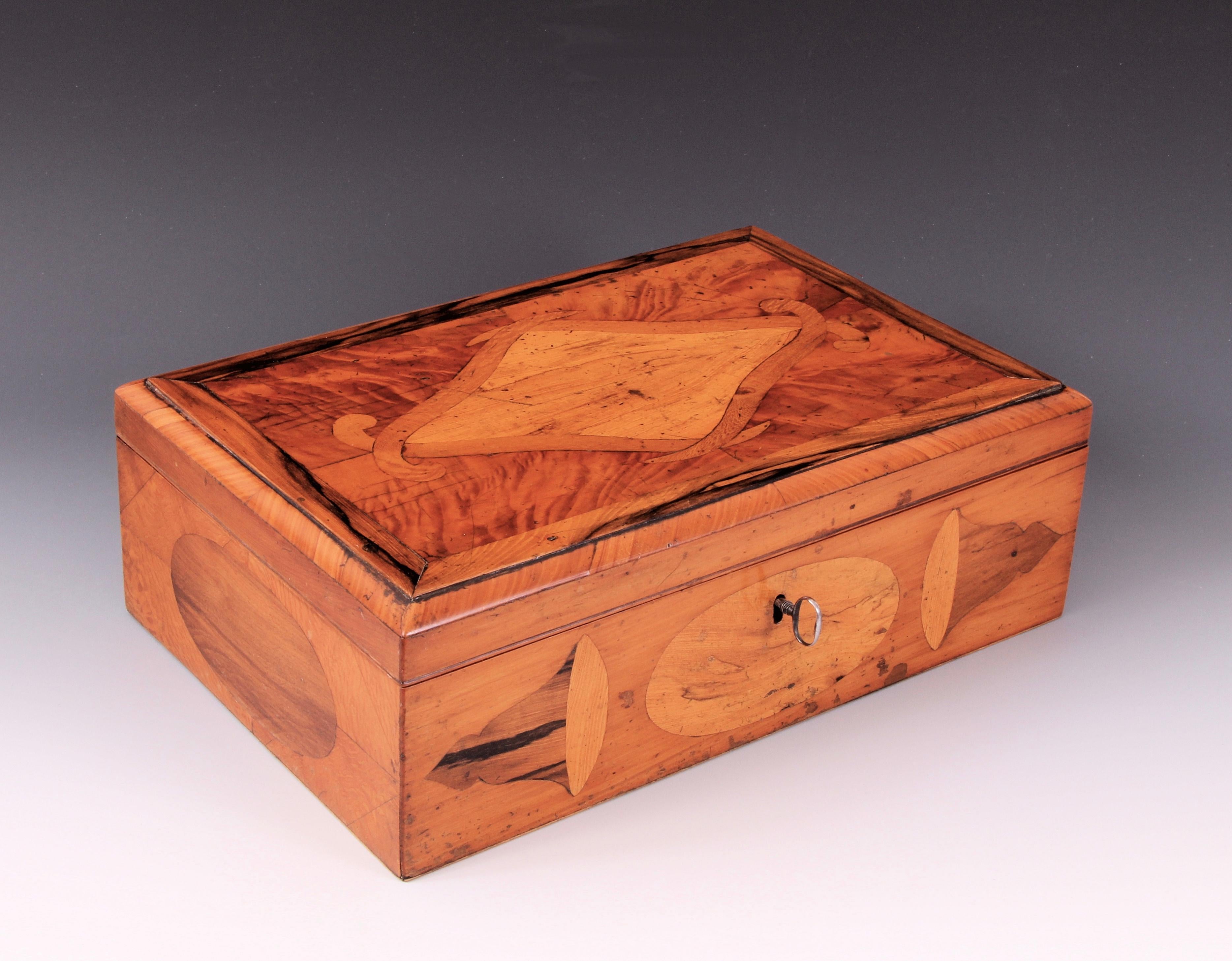 Extremely rare early 19th century New Zealand specimen wood casket.

An early example with a wonderful color and patina

Beautifully made using native New Zealand timbers

Visually beautiful with multiple uses

This superb piece incorporates