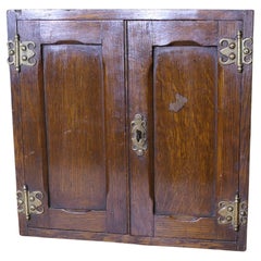 Credenza in Oak dell'inizio del XIX secolo Un pezzo molto attraente con 2 porte