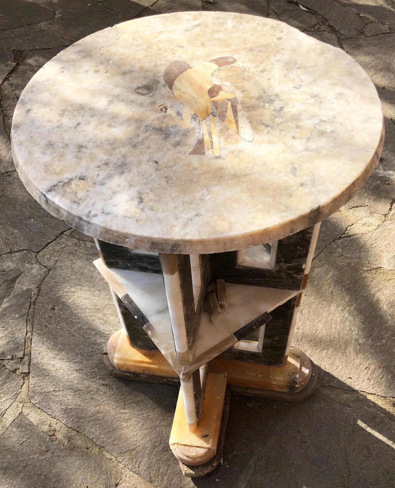 Antique original  marble table made of three blocks, with a bird motif inlaid on the top.
Parts in alabaster and small pieces of marble of various types are missing, the table is to be restored.
Size (cm.): Diameter 47cm, height 75cm
Rarity, due to