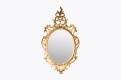 Early 19th Century Oval Giltwood Mirror in the Rococo Style