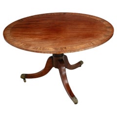 Early 19th Century Oval Mahogany and Rosewood Tip-Up Breakfast Table