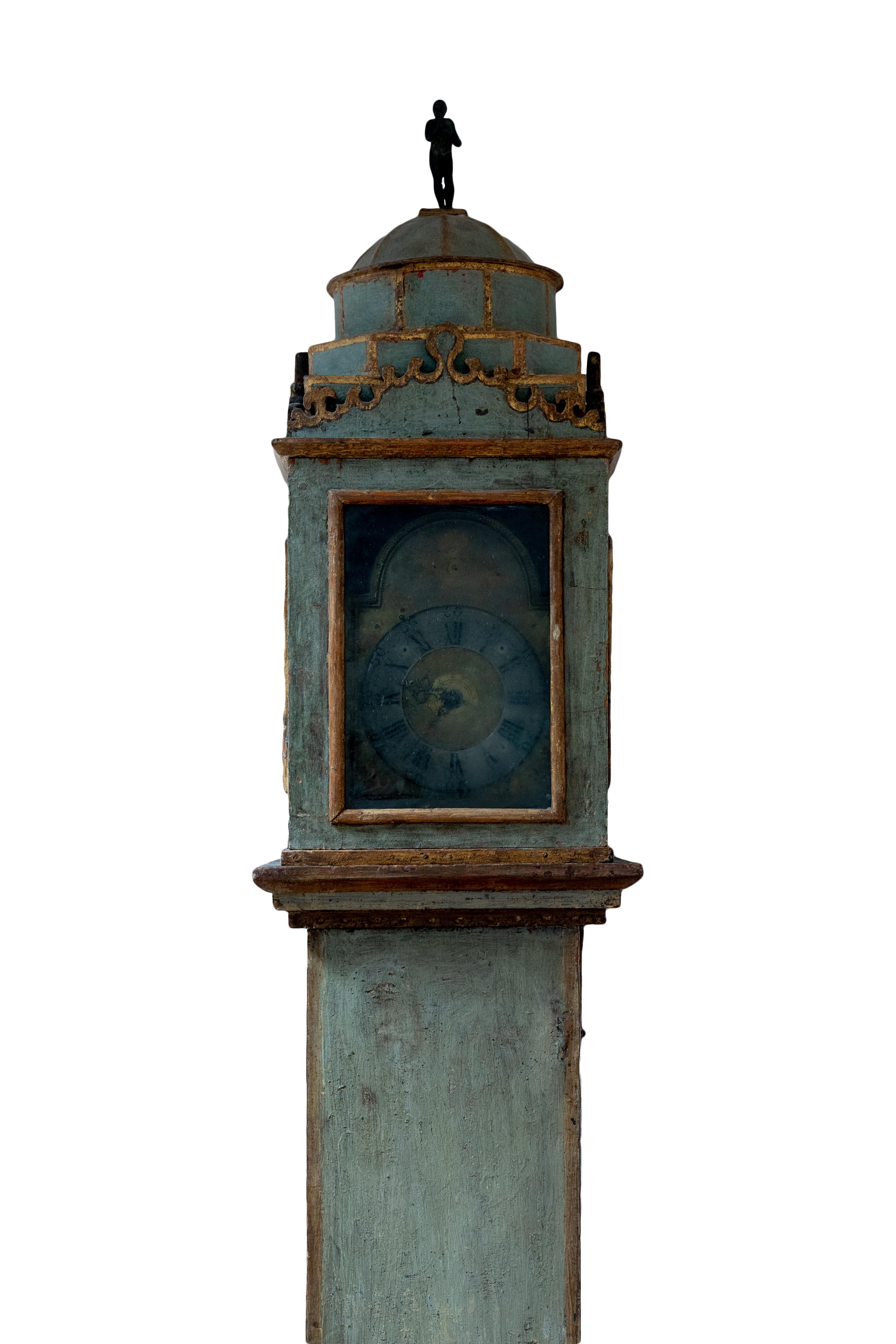 Swedish Pine Continental Clock with pendulum from the early 19th Century. This is a traditional floor clock that is commonly referred to as a Mora clock. It is made from pine wood, which is native to Sweden, and features a distinctive green-blue