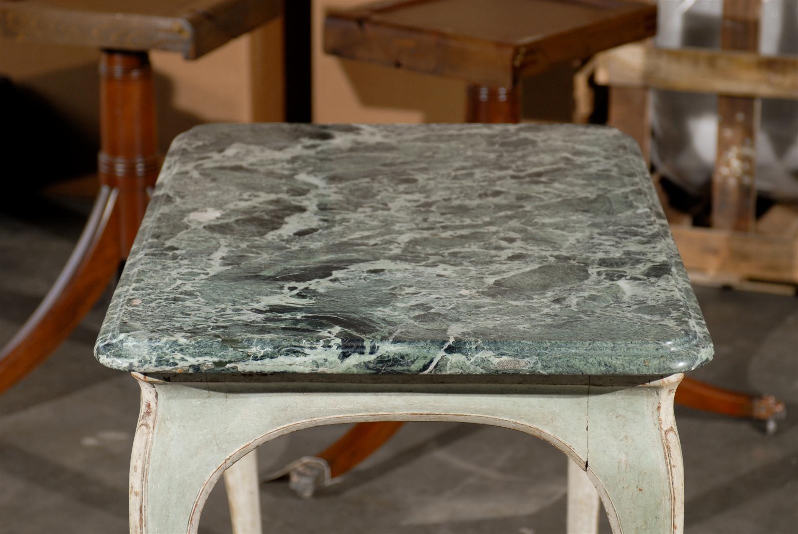 18th-19th century painted green French Louis style table with green marble top.