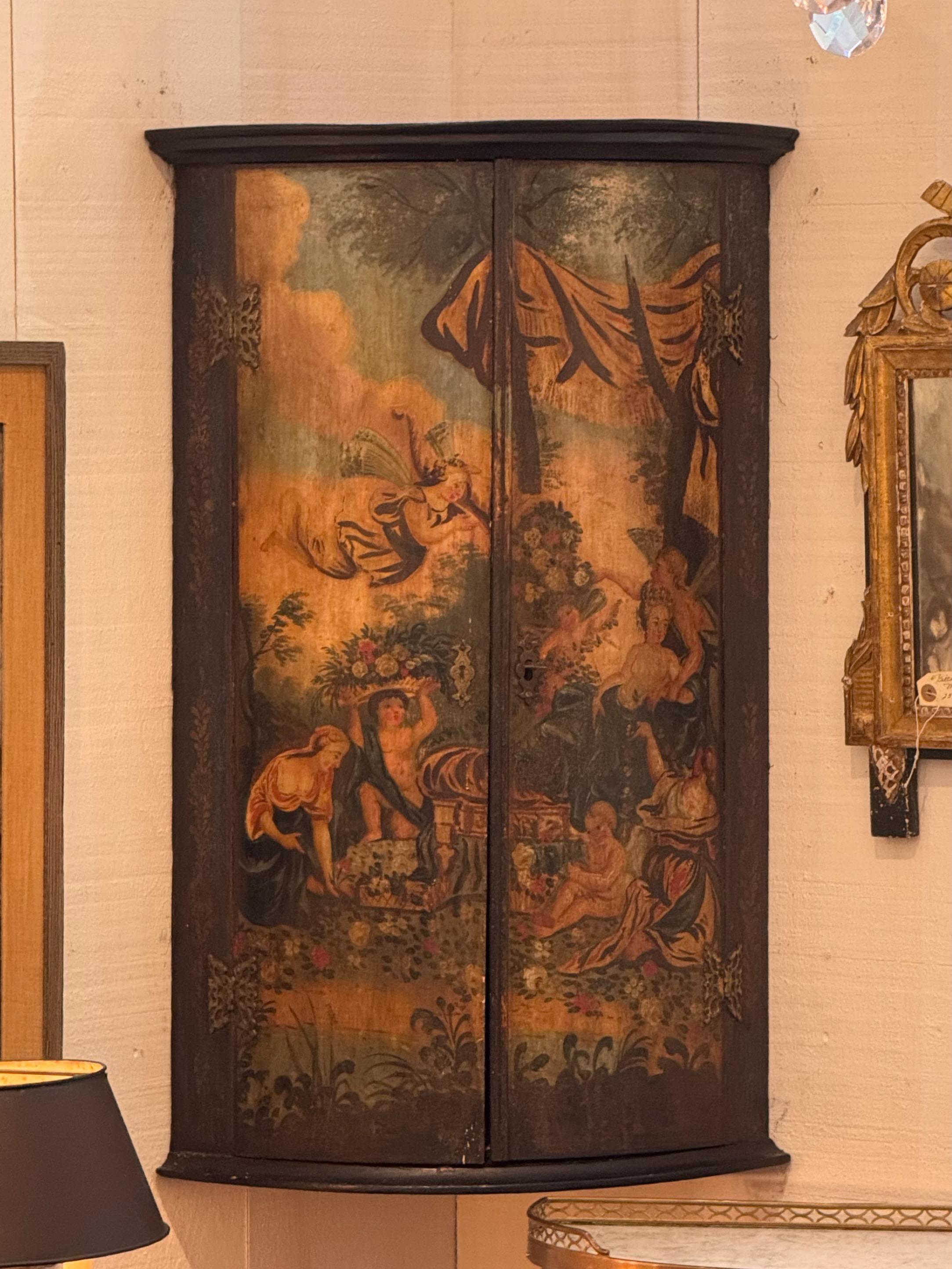 Ein mit Farbe verzierter Eckschrank. Angenehme Farben und Szene.