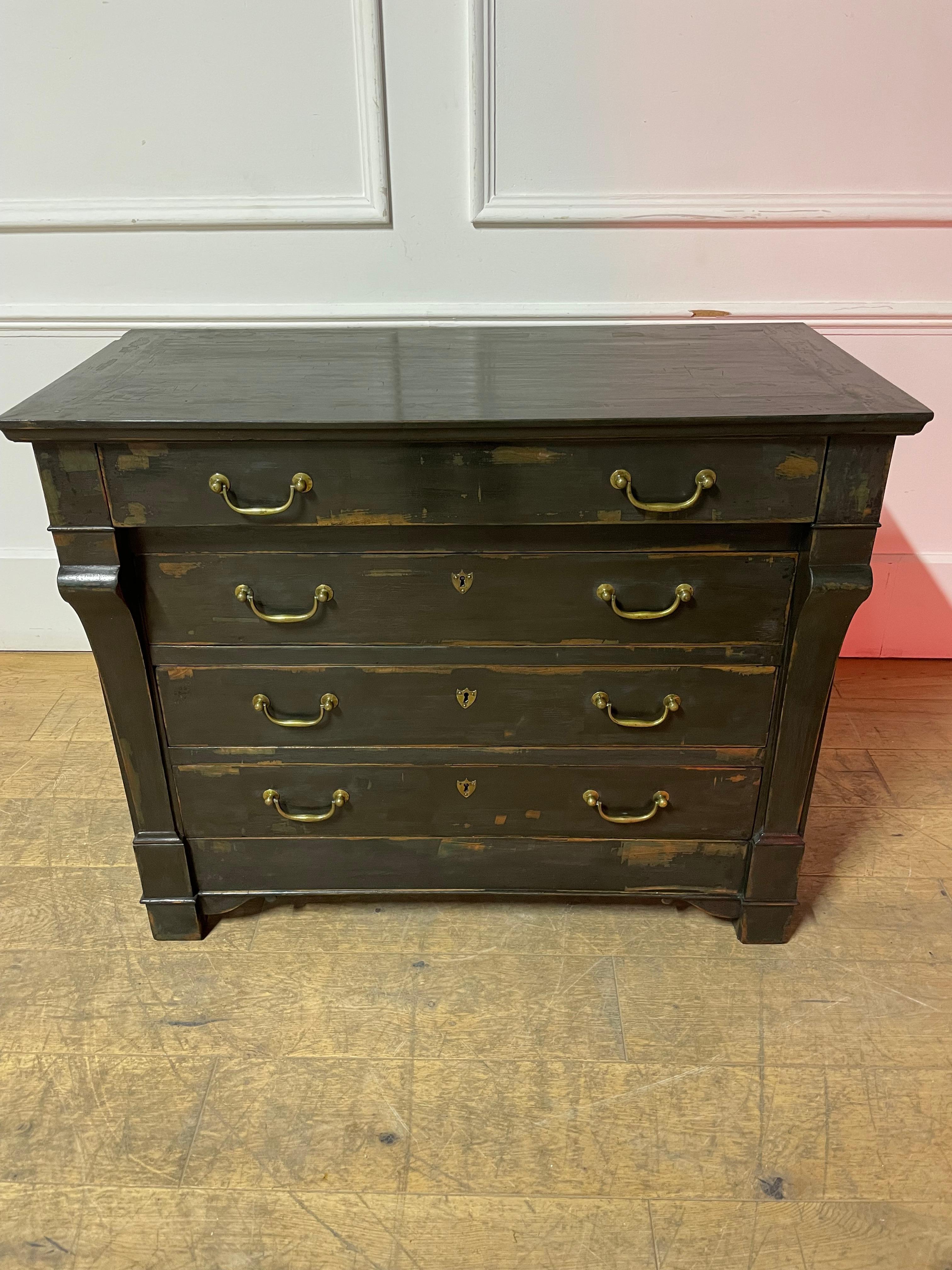 Early 19th century painted walnut small commode/chest of drawers.
French Circa 1820’s.With lovely brass handles and a dark distressed paint finish.
Height 32.5 inches or 82.5 cms
Width 39.5 inches or 100 cms
Depth 18.5 inches or 47 cms