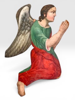 Early 19th Century Pair of Continental Polychrome Carved Wood Adoring Angels.