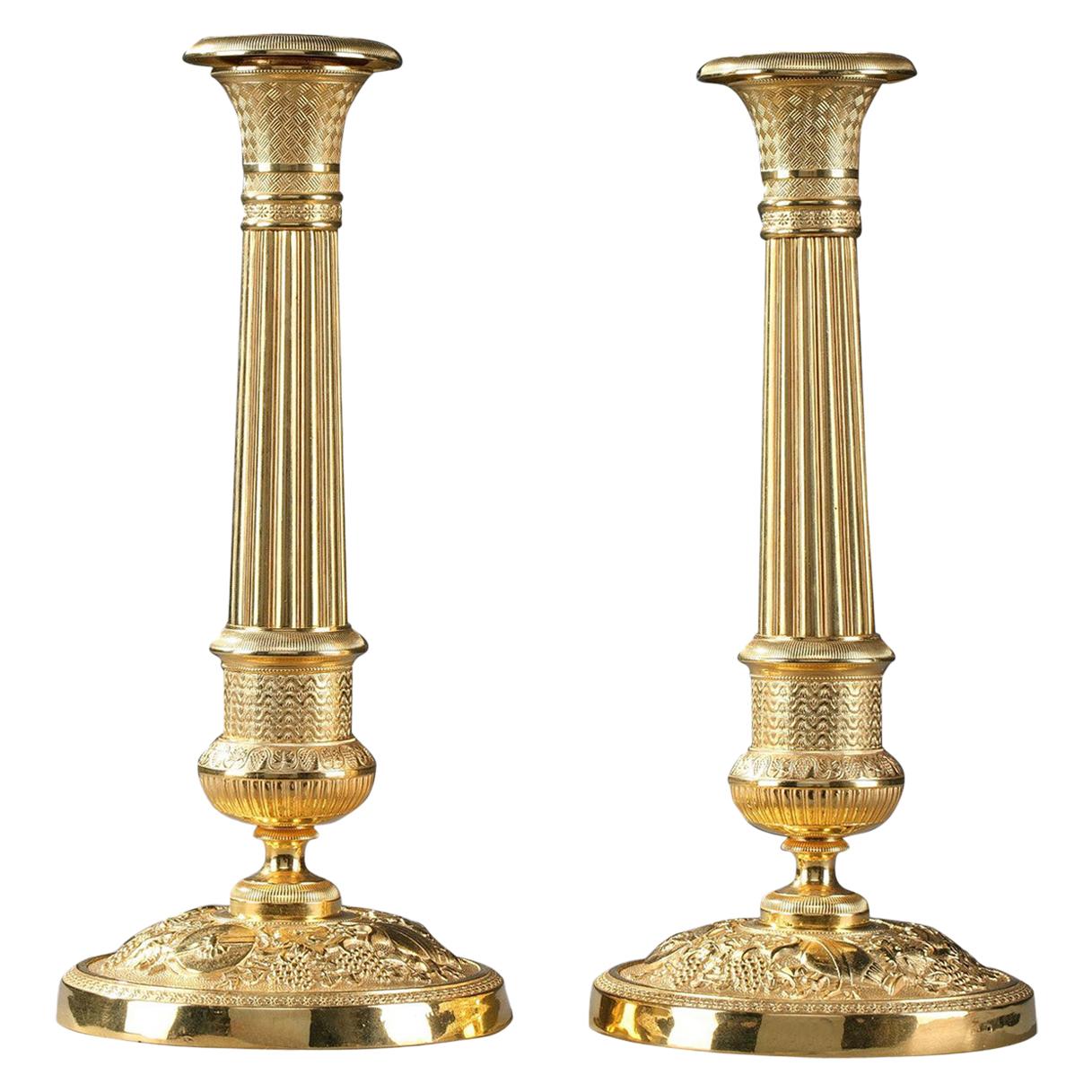 Early 19th Century Pair of Gilt Bronze Restauration Candlesticks