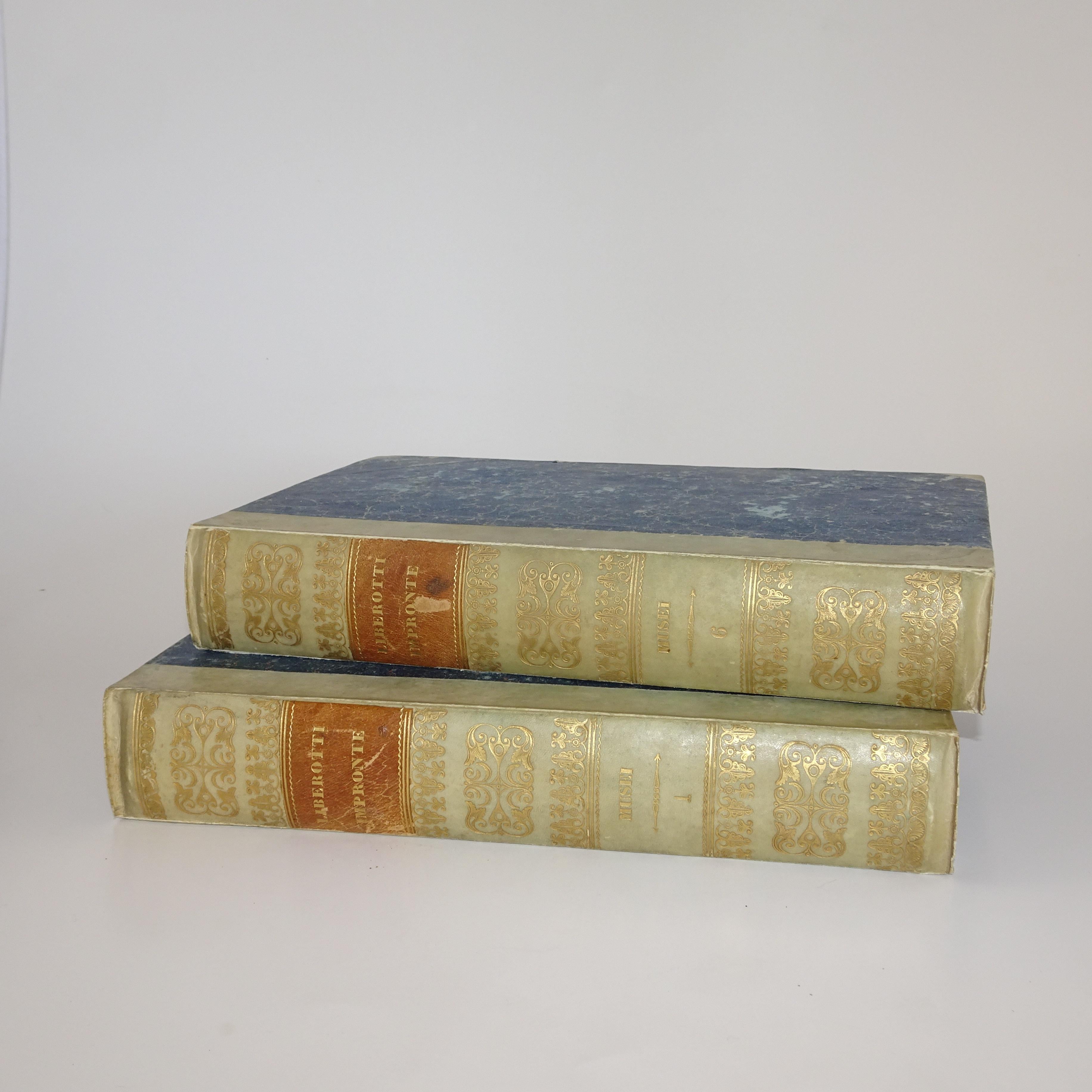 Original set of Grand Tour plaster intaglios. The set is in a double-sided box designed as a book with half marbled boards with gilt lettered vellum spine, speckled ‘page edge’. Inside the front and back cover is a hand written key describing the