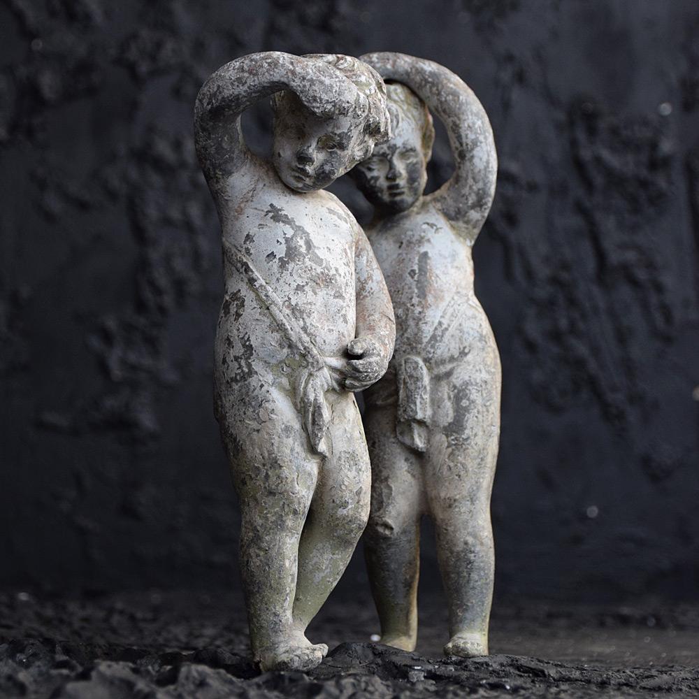 Early 19th century pair of lead putti figures 

A charming matched pair of hand-crafted early 19th century lead putti figures. 

Size in inches: H 10” x W 4” x D 3”
Date: 1820
Material: Lead
Origin: Unknown 
Condition: Fair

Completely