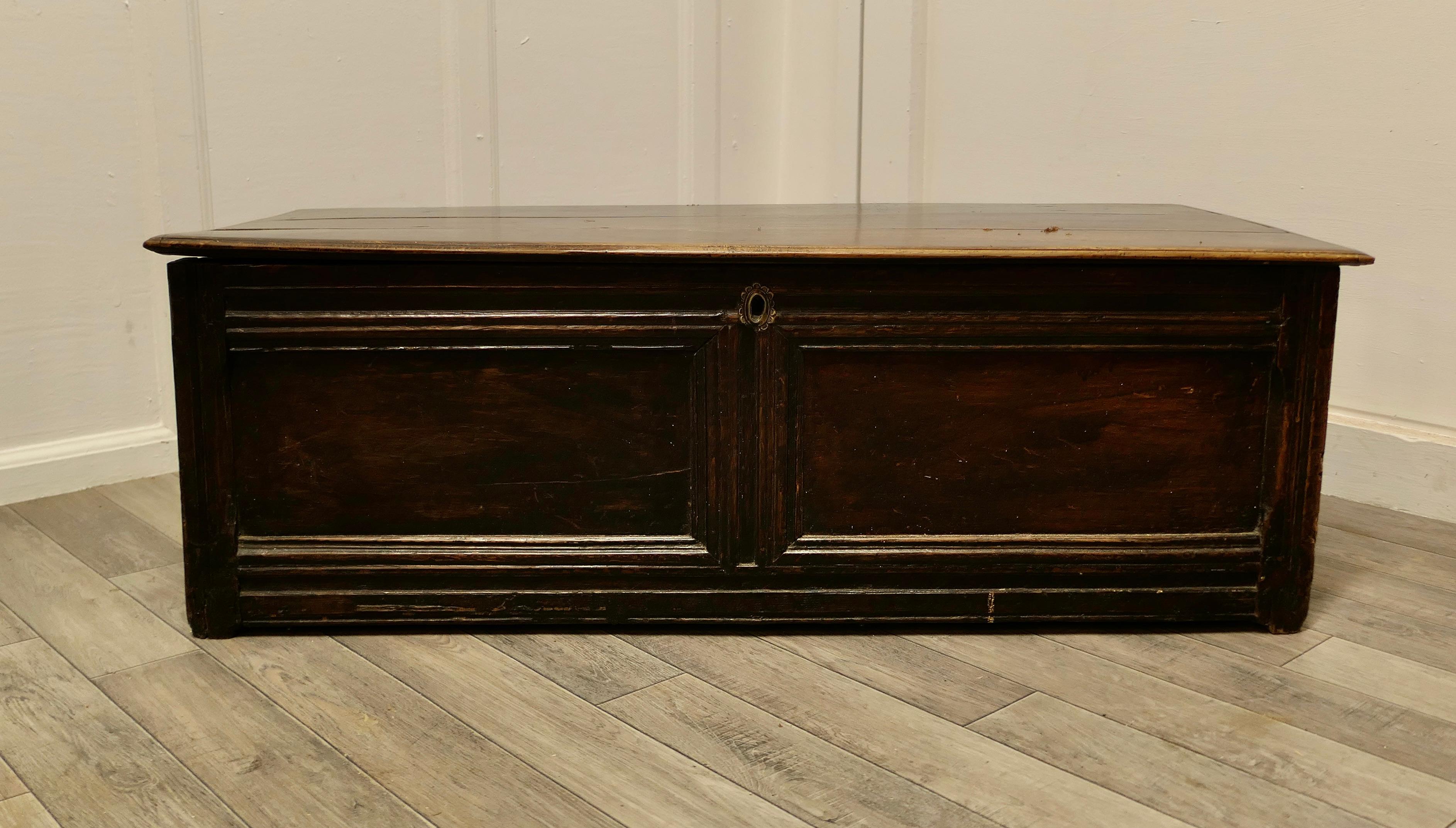 Early 19th Century Panelled Oak Coffer 


This is a lovely old piece, with a good patina, the chest has two moulded panels on the front, back and one on each end, so a looks good from all sides, it has a plank top with a little separation of the