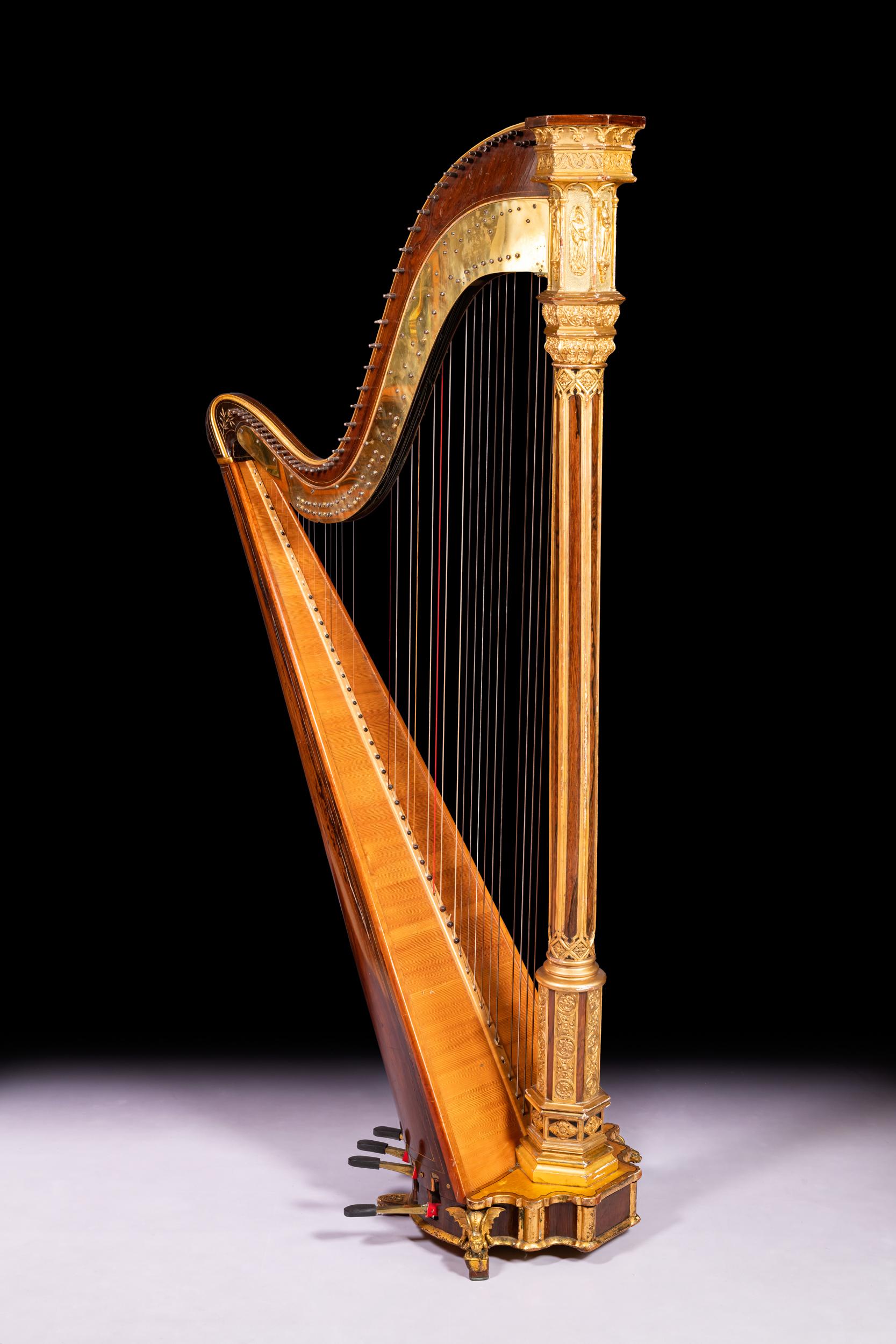 A very fine and elegant Regency Satinwood and parcel-gilt double action Harp from the workshop of the famous harp and piano maker Sebastian Erard (1752-1831), decorated in the Grecian revival manner, inscribed 'Sebastian Erard's/Patent 6599/18 Great