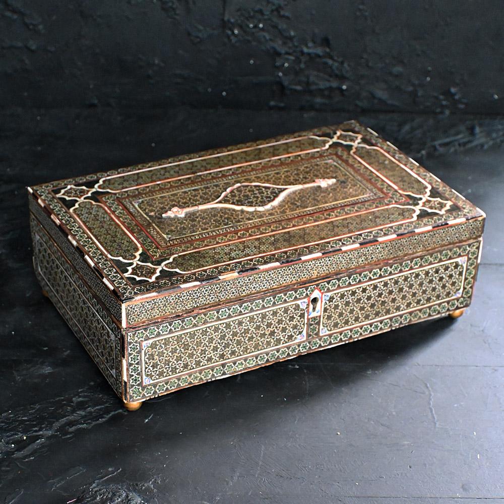 Early 19th century Persian wooden box
A large Persian wooden box and marquetry called 