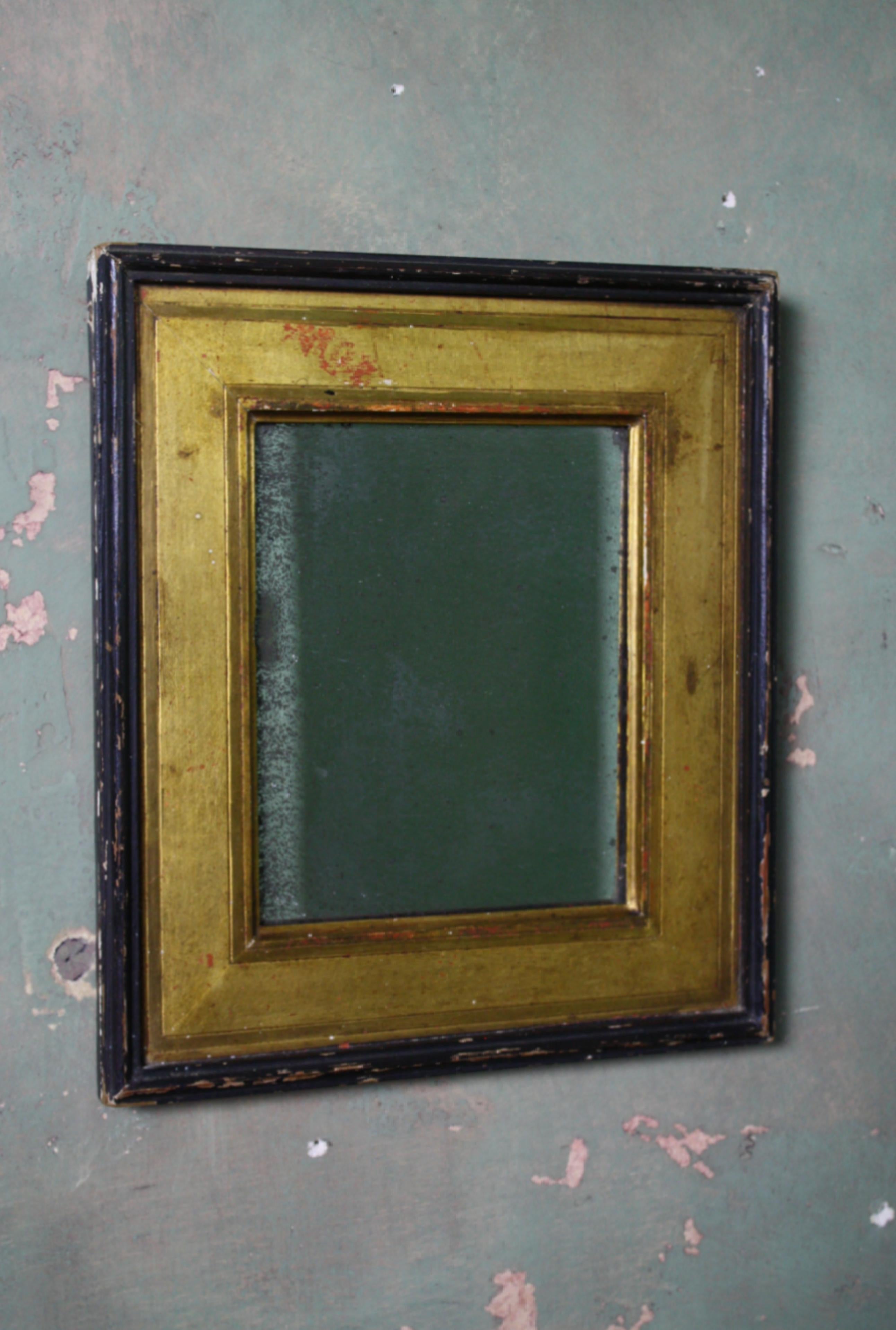 A charming petite Regency mirror, housed in its original gilt and ebonised pine frame.

The back has been added too at a later date, the mirror plate is heavily foxed, pitted from oxidization.

Age related ware to the frame

21/24cm.

  